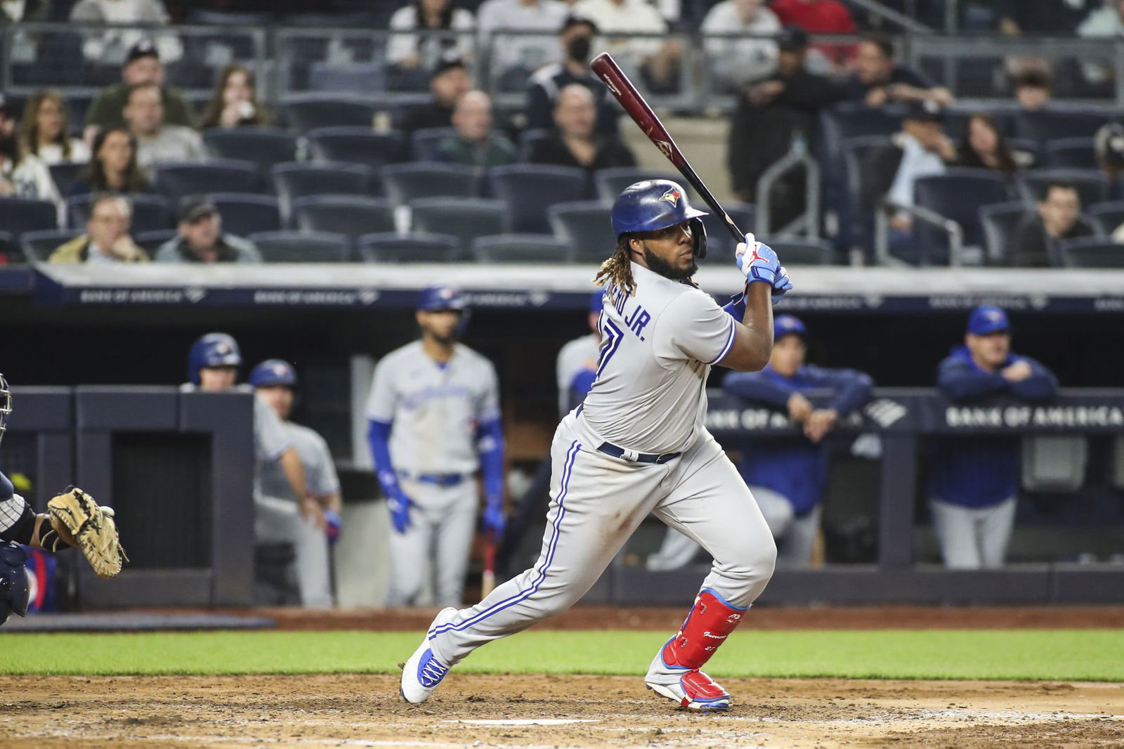 Toronto Blue Jays first baseman Vladimir Guerrero Jr. (27) hits a double in the sixth inning against the New York Yankees at Yankee Stadium in the Bronx, New York on April 13, 2022.