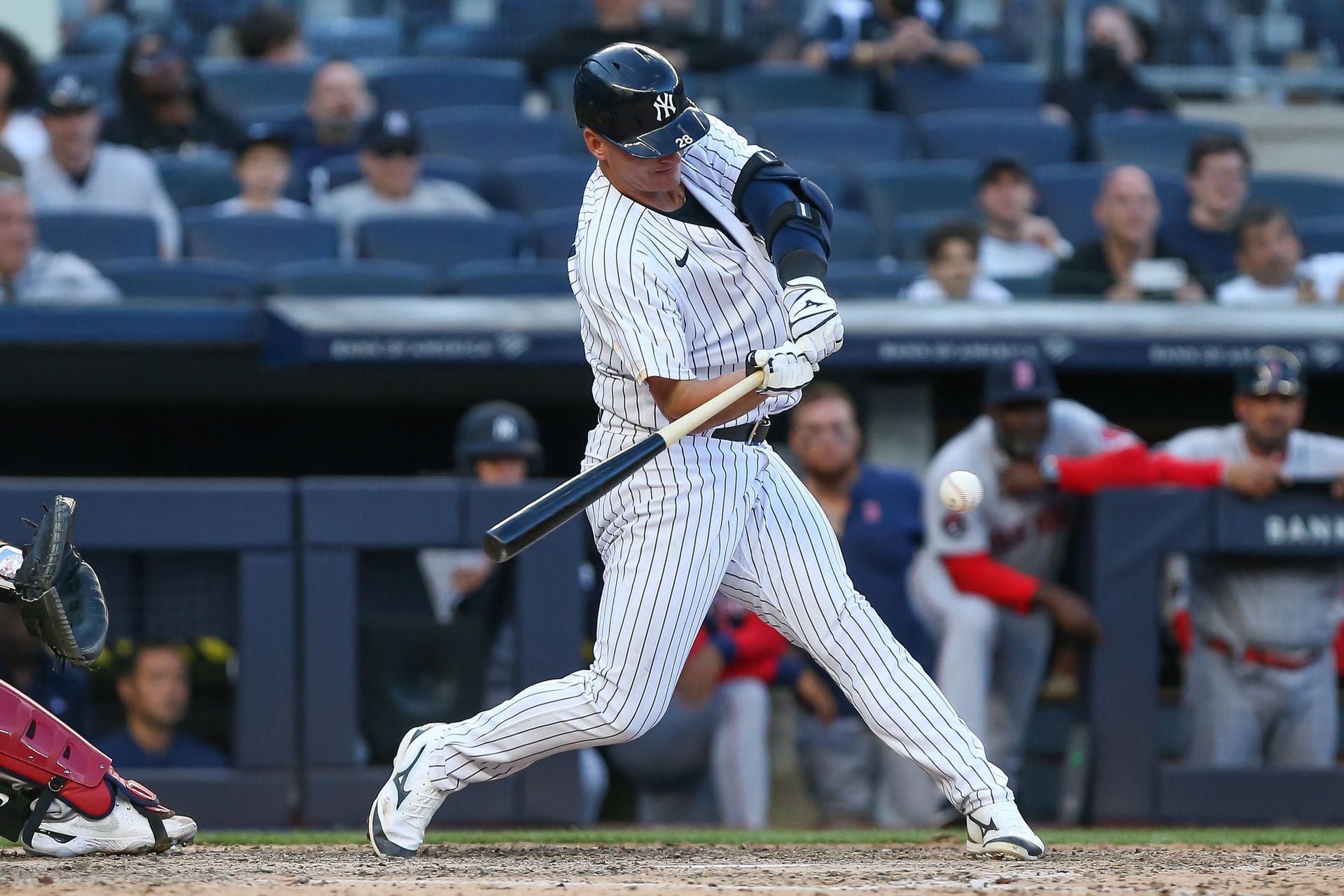 New York Yankees third baseman Josh Donaldson (28) hits a single to drive in the winning run and defeat Boston Red Sox during the 12th inning at Yankee Stadium in Bronx, New York on April 8, 2022.
