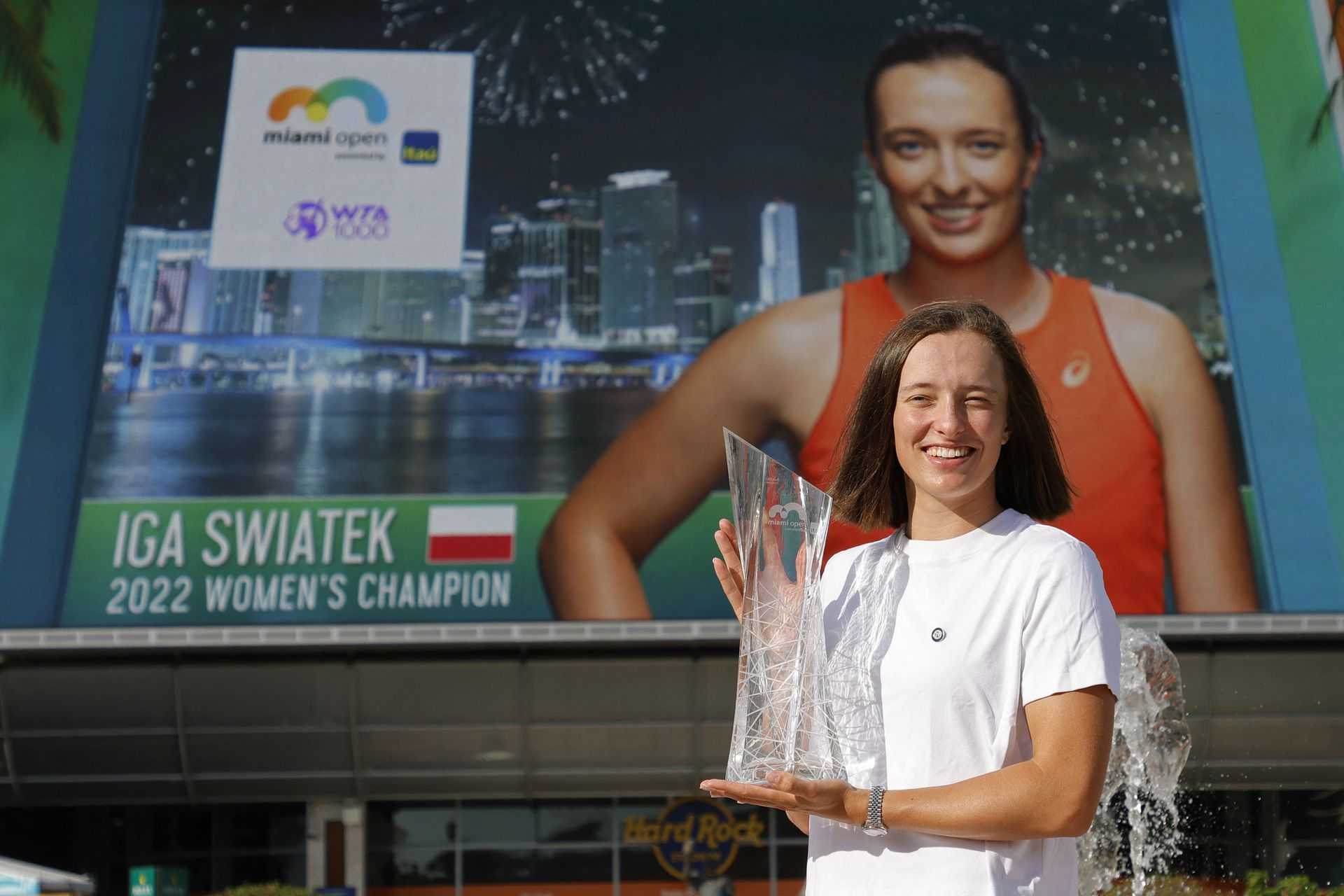 Iga Swiatek poses for a portrait with the Butch Buchholz Championship Trophy after the women's singles final in the Miami Open at Hard Rock Stadium in Miami Gardens, Florida on April 2, 2022.