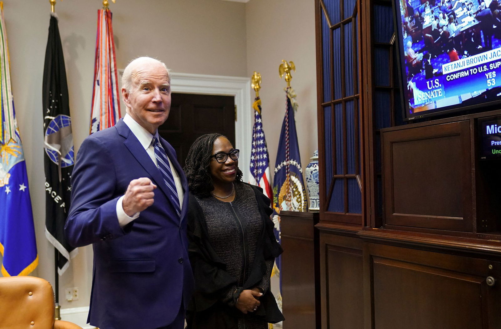 President Joe Biden and Supreme Court nominee Judge Ketanji Brown Jackson watch as the full U.S. Senate votes to confirm Jackson as the first Black woman to serve on the U.S. Supreme Court, from the Roosevelt Room at the White House in Washington, D.C., April 7, 2022.