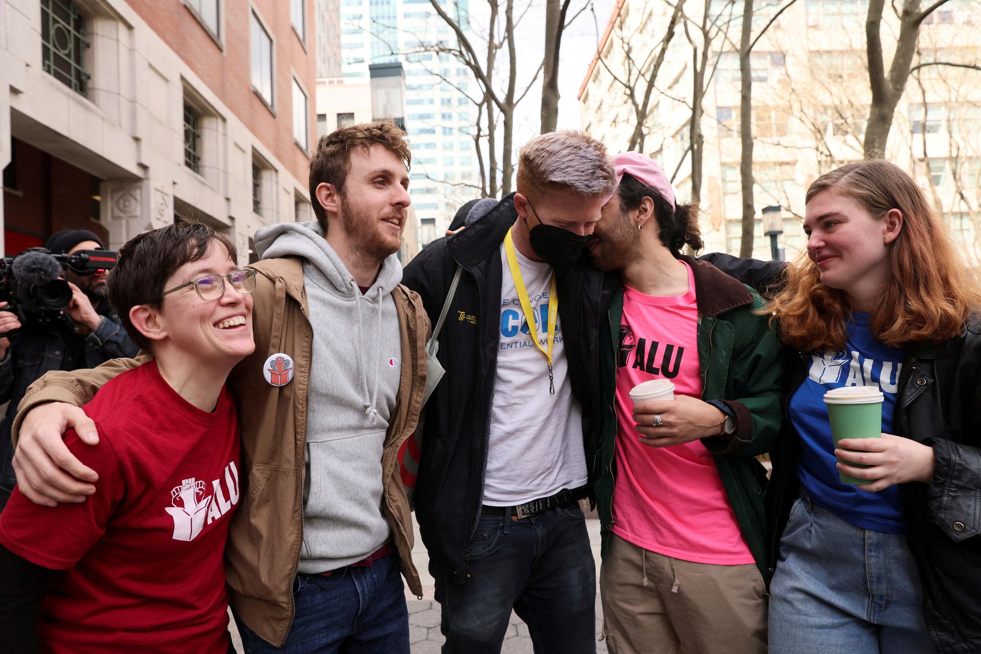 Amazon workers celebrate after hearing preliminary results regarding the vote to unionize, outside the NLRB offices in Brooklyn, New York City on April 1, 2022.