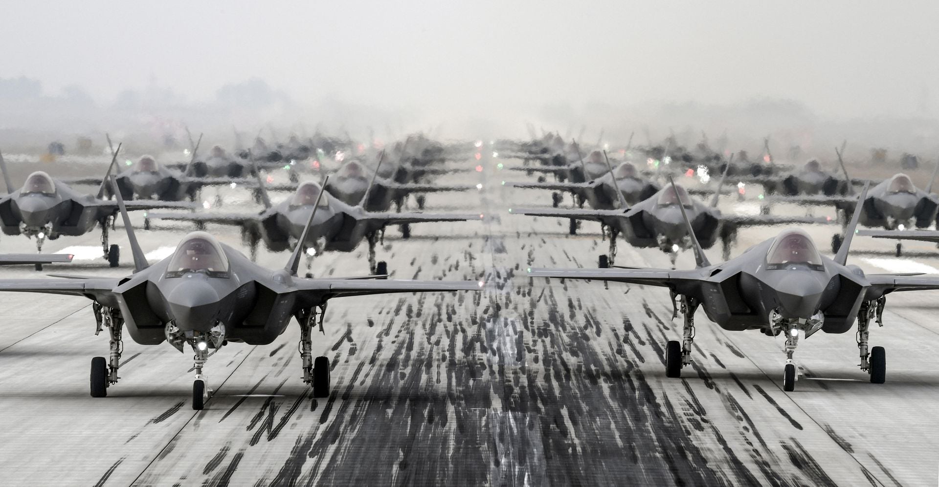 F-35A fighter jets are seen during a military exercise "Elephant Walk" at an airbase, in this handout provided by the South Korean Defense Ministry on March 25, 2022.