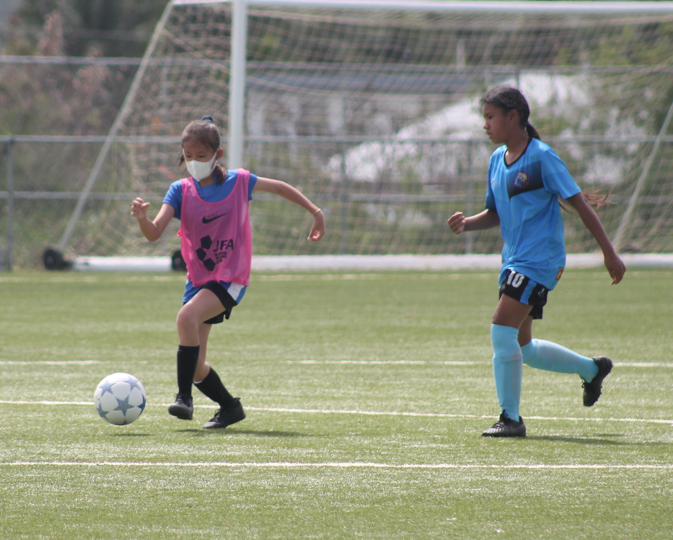 SIS' Ester Yoon pushes forward during the championship game against FMS.