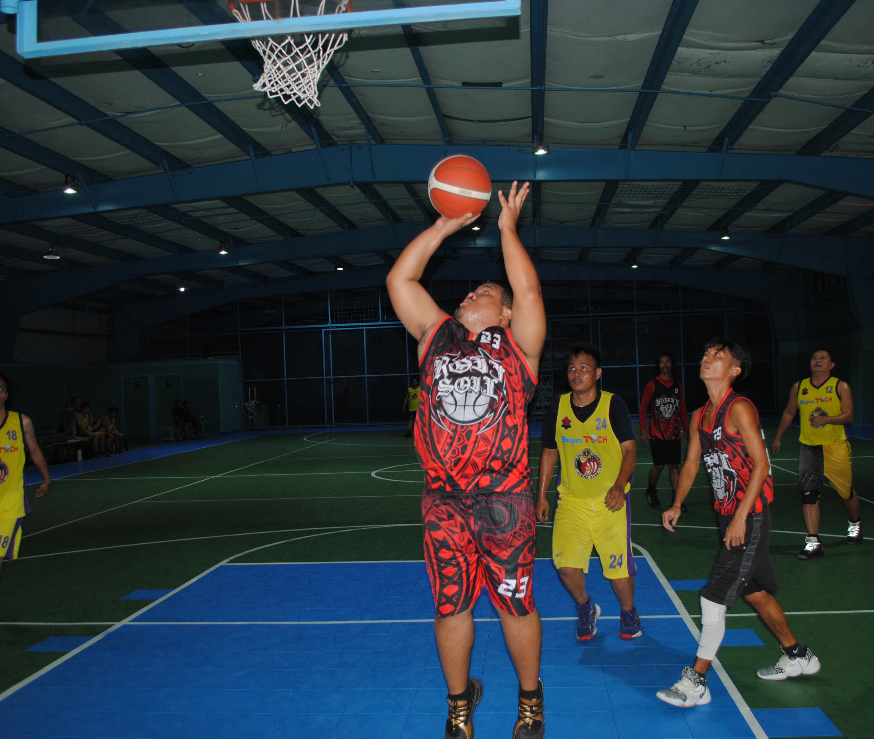 Paradise Realty's Bry Sablan pulls up for the open shot during an open division game of the Saipan Centennial Lions Club Basketball League on Friday at the TSL Sports Complex.