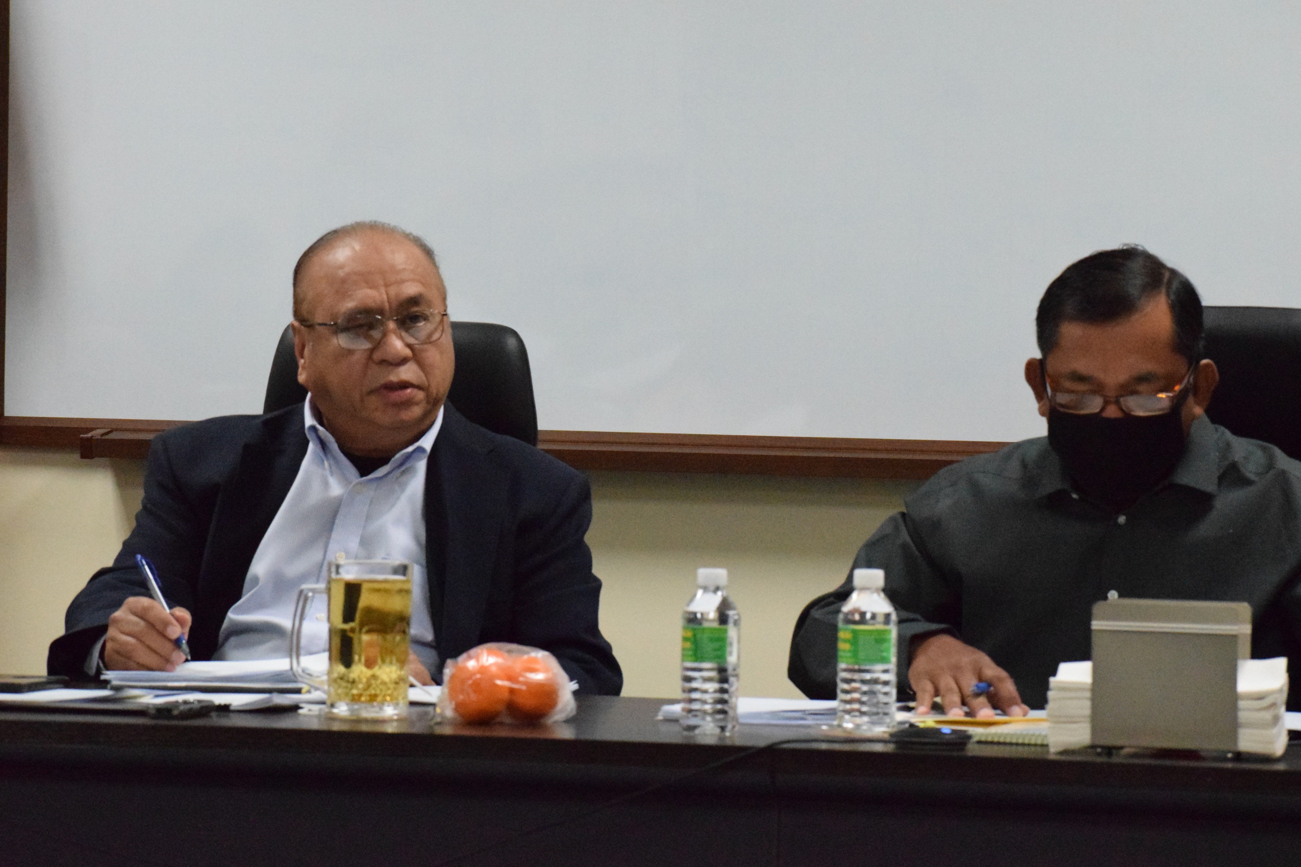 Commonwealth Casino Commission Chairman Edward C. Deleon Guerrero, left, and Vice Chairman Ralph S. Demapan attend a commission meeting in January last year.