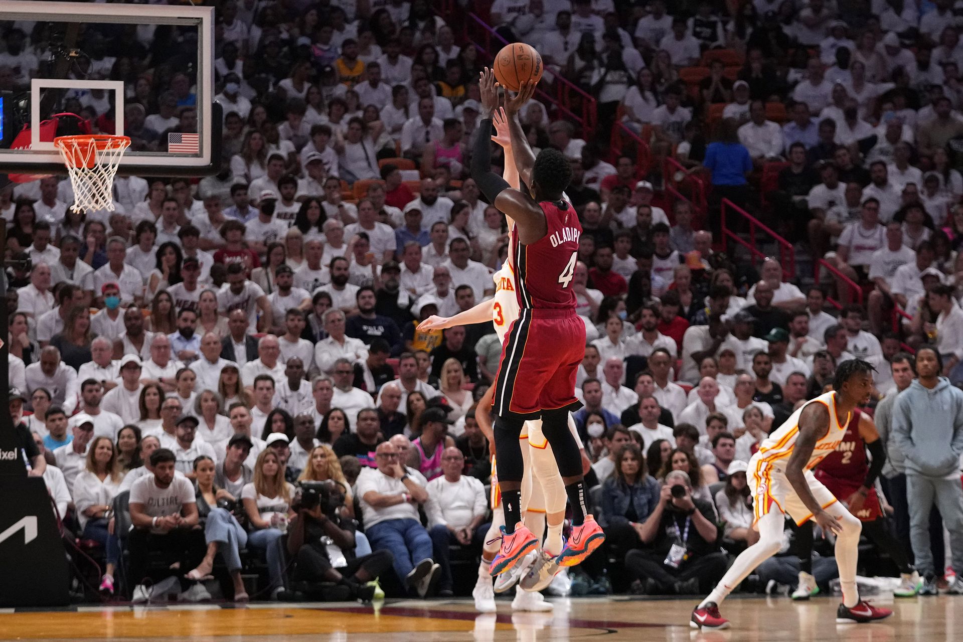 Miami Heat guard Victor Oladipo (4) attempts a three point shot over Atlanta Hawks guard Kevin Huerter (3) during the second half in game five of the NBA playoffs’ first round at FTX Arena in Miami, Florida on April 26, 2022.