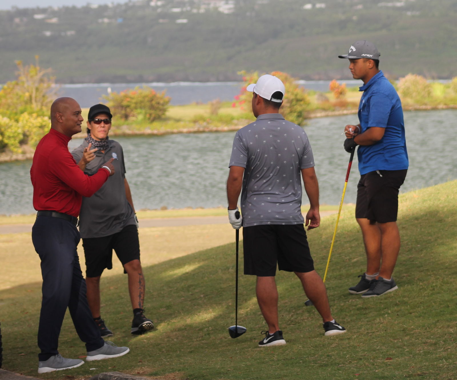 Championship Flight players gather for a conversation.