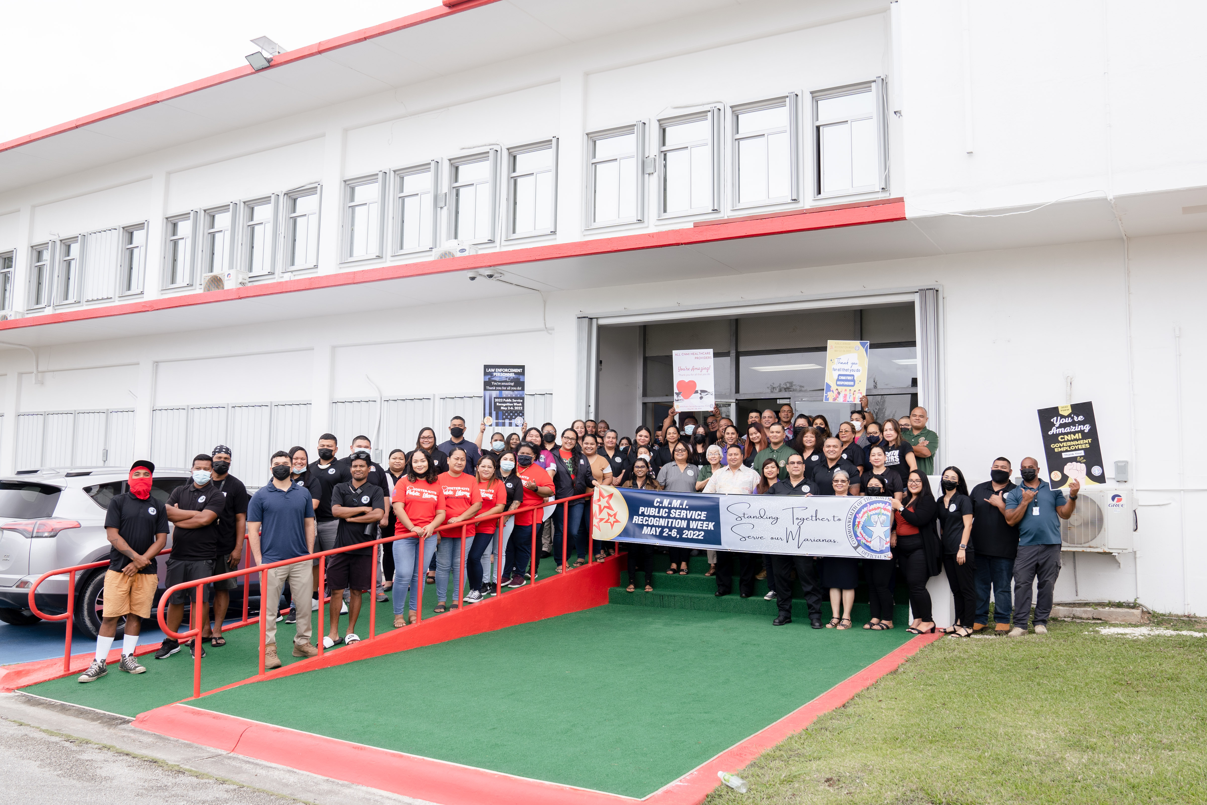 Gov. Ralph DLG Torres, joined by Office of Personnel Management Director Frances T. Torres-Salas, members of the Public Service Recognition Week Committee, lawmakers, other officials and government personnel pose for a photo after a proclamation signing for Public Service Recognition Week, Tuesday, at the administration building on Capital Hill.