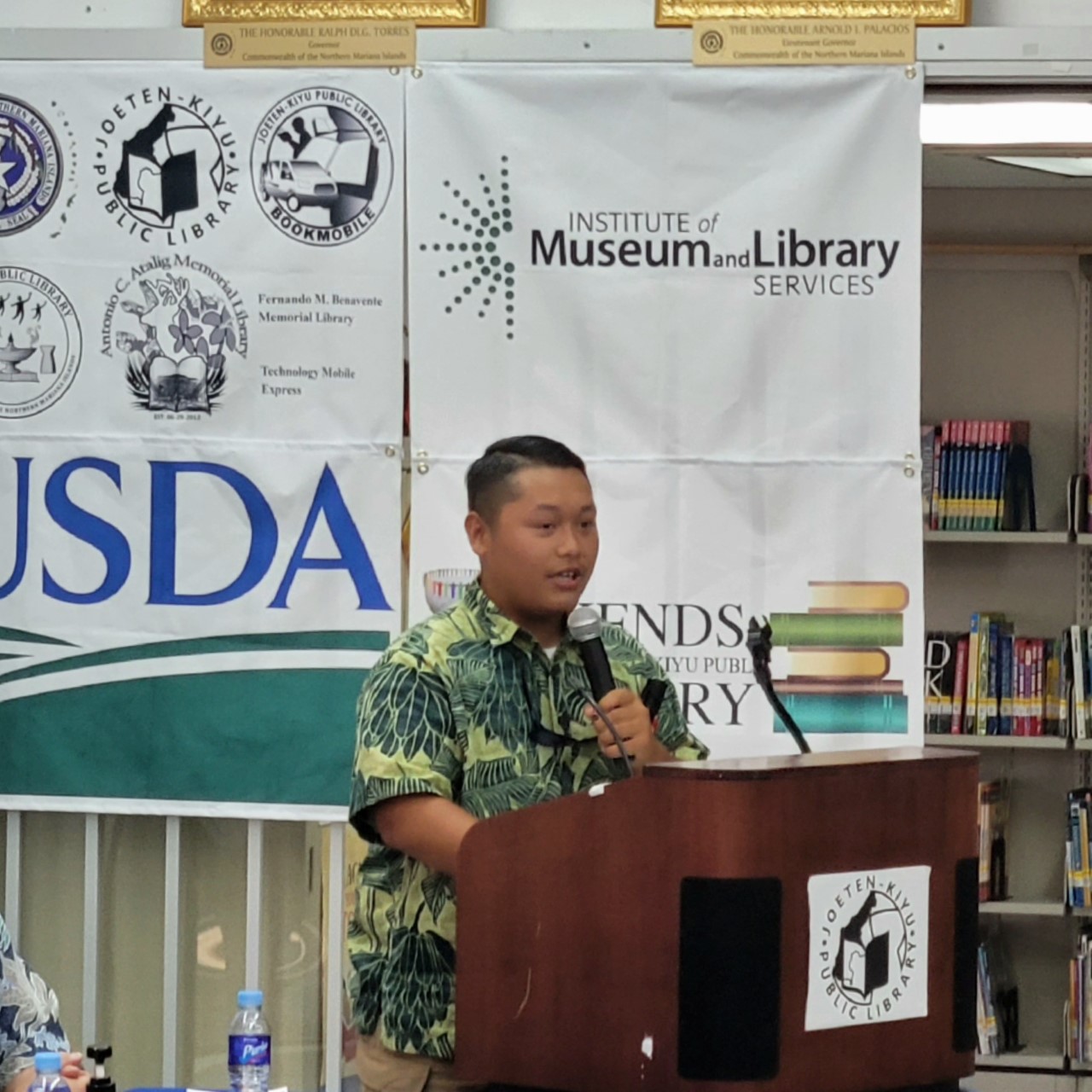 Youth Sen. Easton C. Dela Cruz of Marianas High School reads the proclamation for National Library Week.