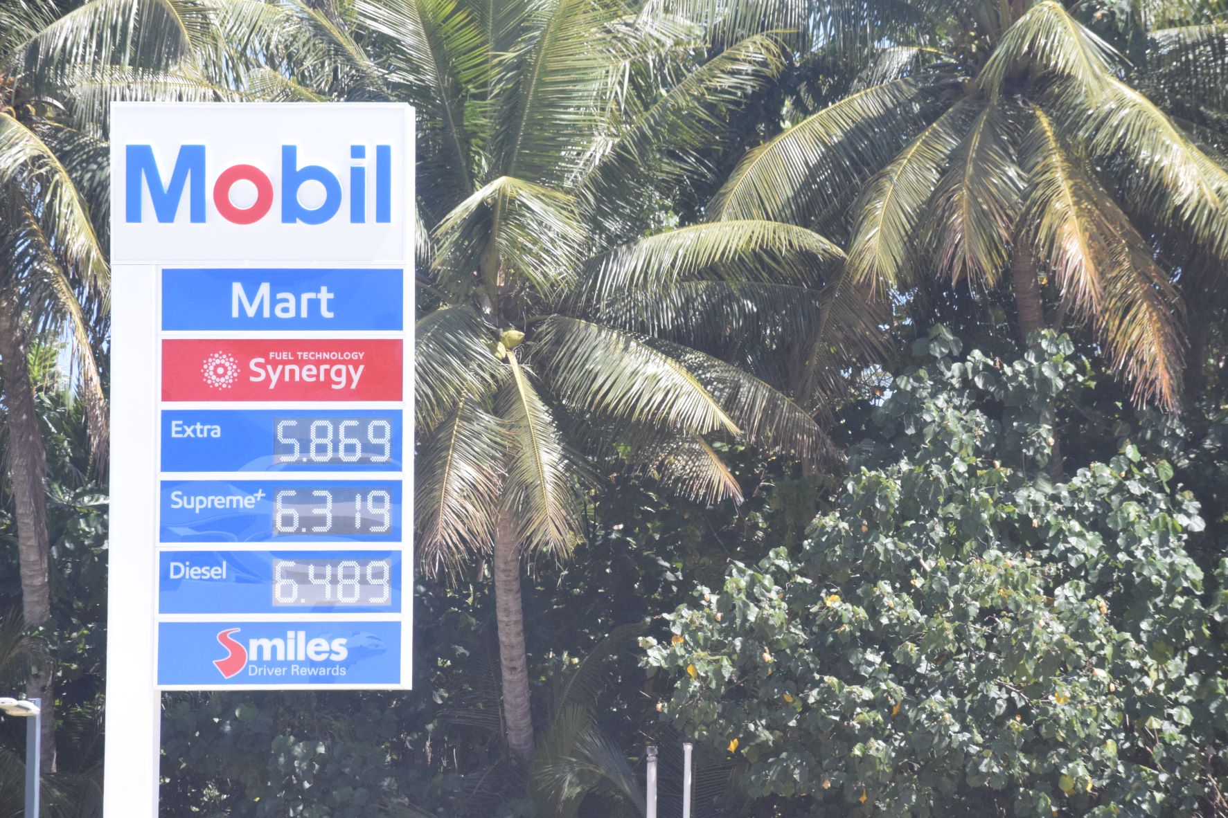 The Mobil Oil in Chalan Kiya displays its new prices on Friday.