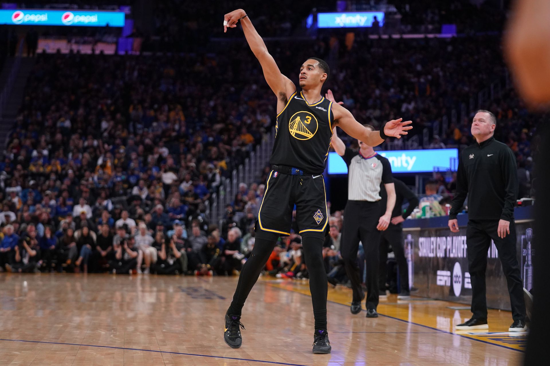 Golden State Warriors guard Jordan Poole (3) follows through on a shot after making a three-point basket against the Denver Nuggets in the fourth quarter during game one of the first round for the 2022 NBA playoffs at the Chase Center in San Francisco, California on April 16, 2022.