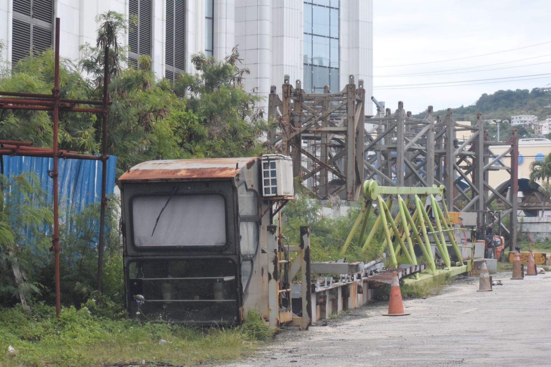 Portions of tower No. 6 that have been left on the ground are now rusting.