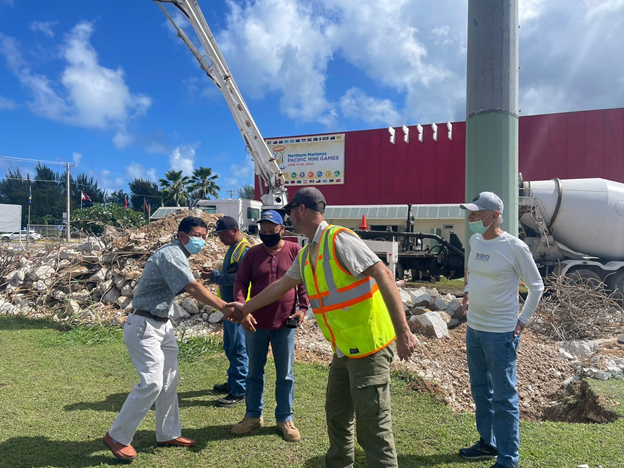 IRP Lead Archaeologist Jeremy Freeman and IRP Section 106 Coordinator Scott Russell discuss with contractor Steve Qian/USA Fanter project details for the Oleai Sports Complex baseball field fencing project. HPO’s John Palacios and Jose Terlaje look on. IRP staff are onsite at the Oleai Sports Complex assisting Public Assistance Office/GAR and Historic Preservation Office on-site monitoring. 