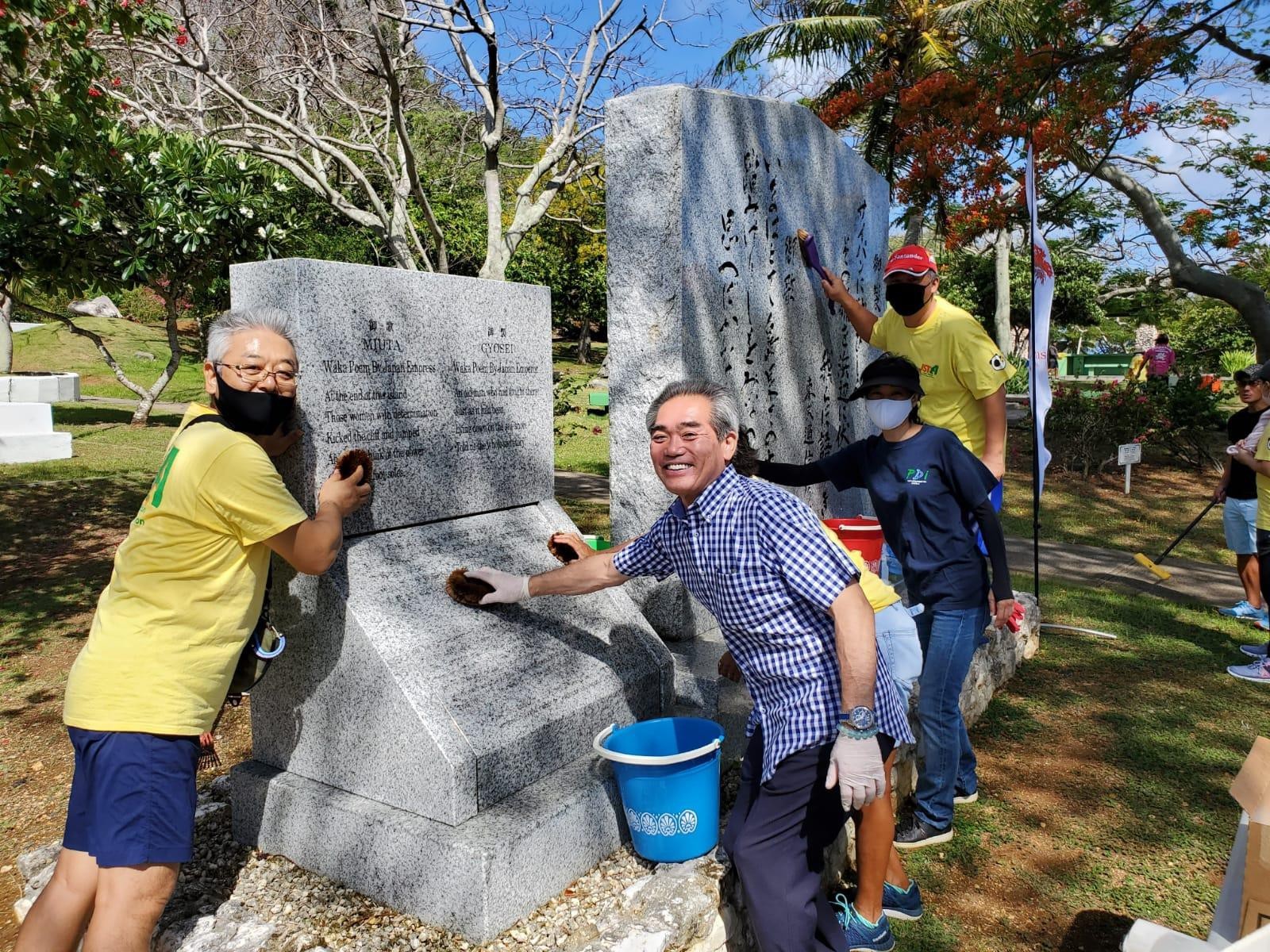 Volunteers clean the Japanese Peace Memorial during the tourism industry cleanup in May 2021 on Saipan.
