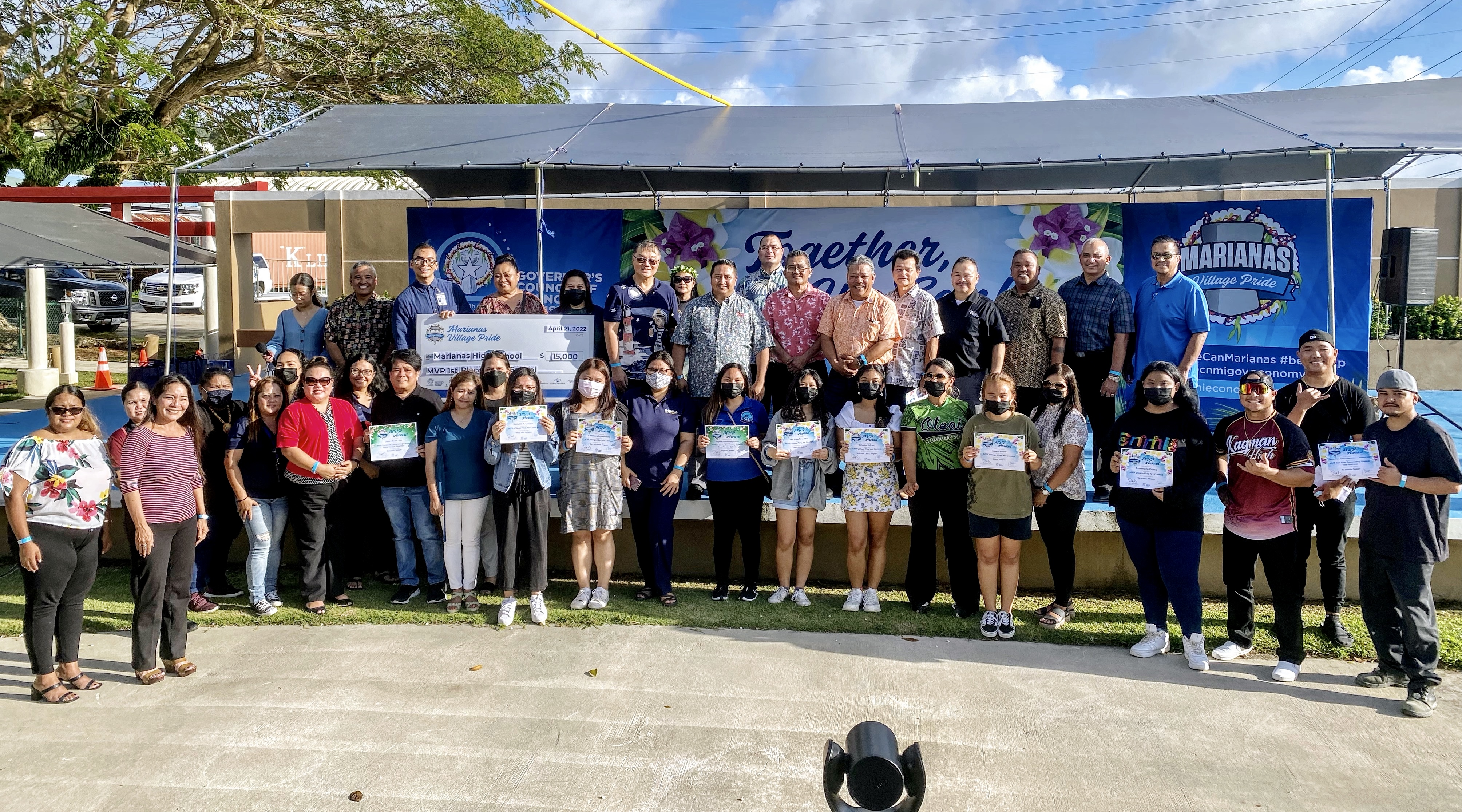 The Governor’s Council of Economic Advisers led by Gov. Ralph DLG Torres and the council co-chairman, Tan Holdings Chief Executive Officer Jerry Tan, on Thursday honored the winners and awardees of the Marianas Villages Pride Project at the Sugar King Park amphitheater. They included public school students, government entities and private businesses. Also in the photo are Commissioner of Education Dr. Alfred B. Ada, the mayors of Rota and Tinian, the  Saipan mayor’s special assistant as well as lawmakers led by their presiding officers.