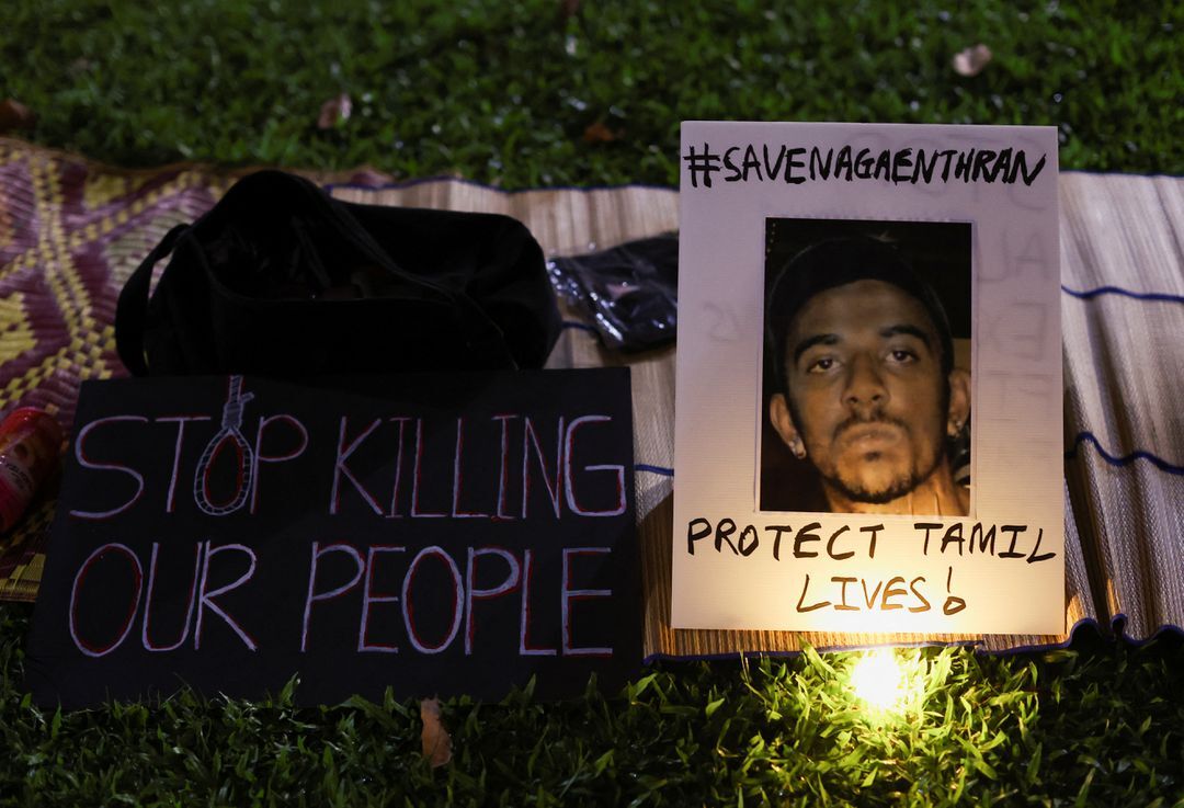 A poster of Nagaenthran Dharmalingam is pictured at a vigil ahead of the planned executions of Malaysians Dharmalingam and Datchinamurthy Kataiah at Hong Lim Park in Singapore on April 25, 2022.