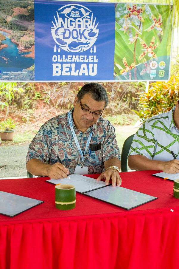 On April 12, 2022 at the Ngardok Nature Reserves in Melekeok State, Palau Minister Kaleb Udui signs the MOU for a partnership for sustainable visitor use and tourism planning between the United States National Park Service and the Republic of Palau.