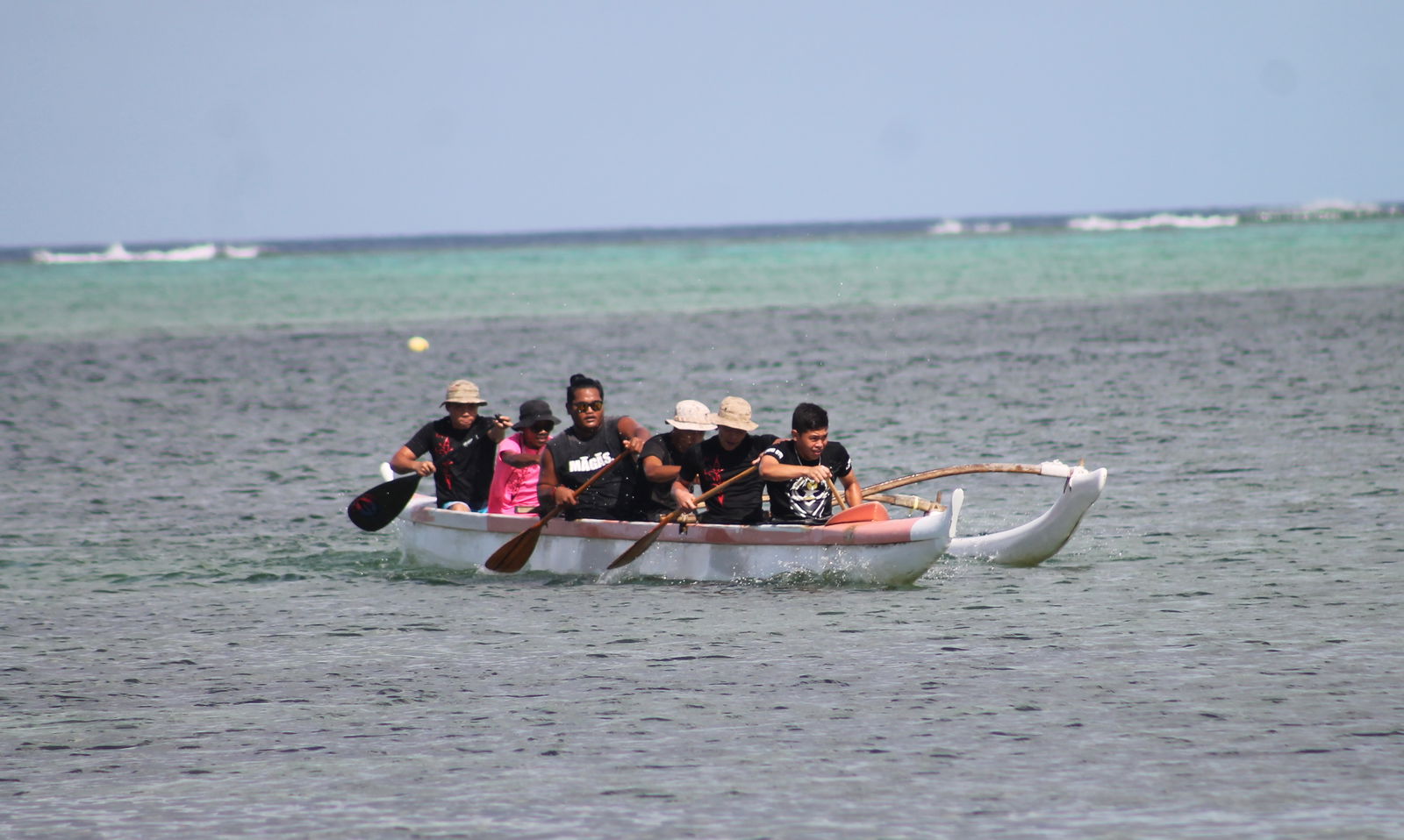 The KHS boys push for the finish during a PSS Interscholastic Outrigger Race at Kilili Beach.