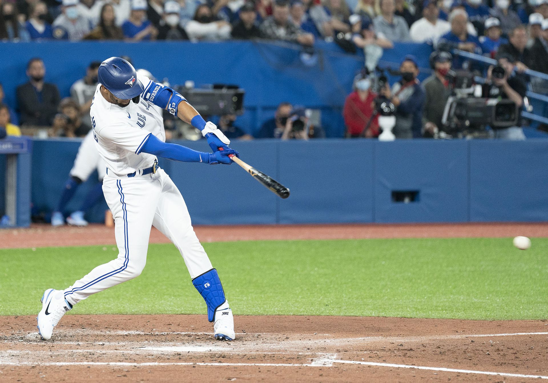 Toronto Blue Jays left fielder Lourdes Gurriel Jr. (13) hits an RBI on a fielder’s choice during the fourth inning against the Texas Rangers at Rogers Centre in Toronto, Ontario on April 8, 2022.