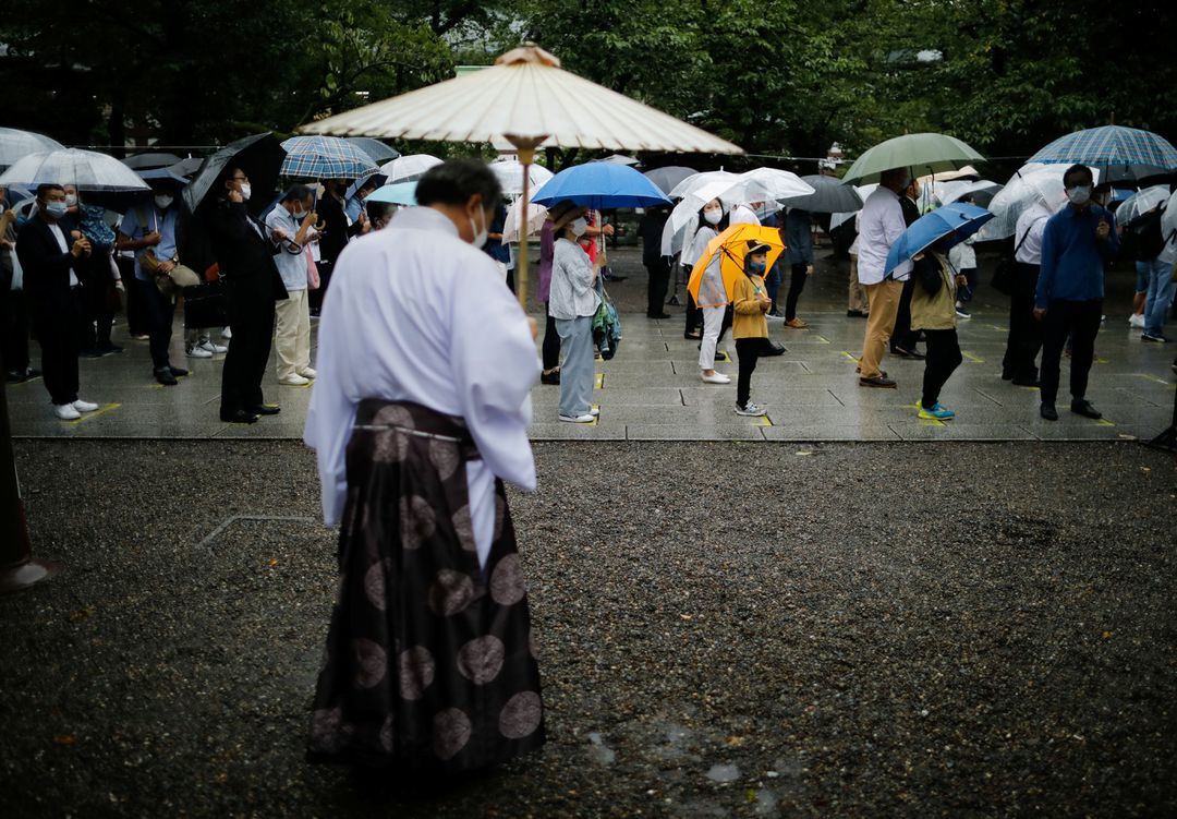 People visit Yasukuni Shrine on the 76th anniversary of Japan's surrender in World War Two in Tokyo, Japan, Aug. 15, 2021.