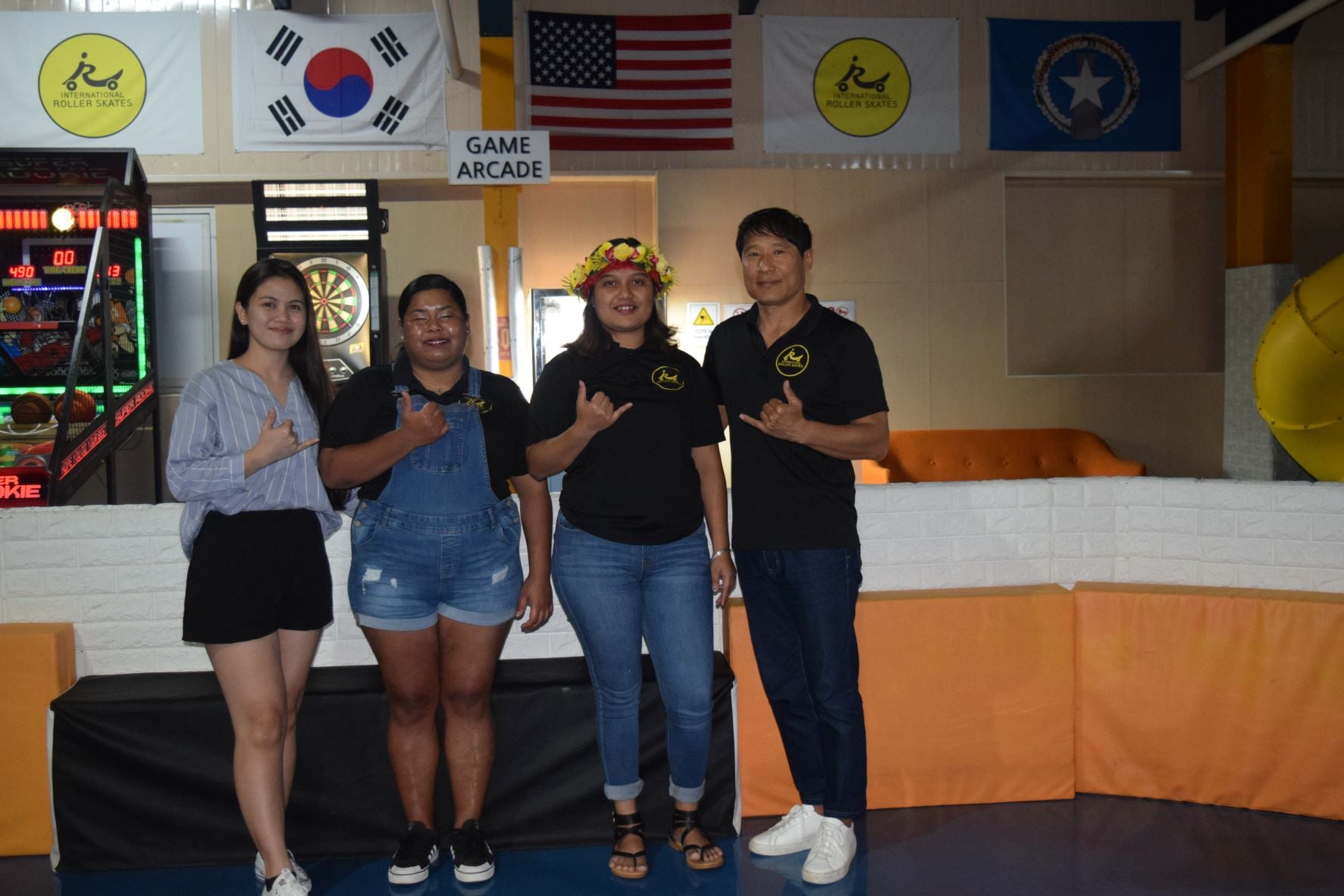 International Roller Skates manager Peter Lee, right with staff members Nica Banayos, Elorene Ayuyu and Mieko Keremen.