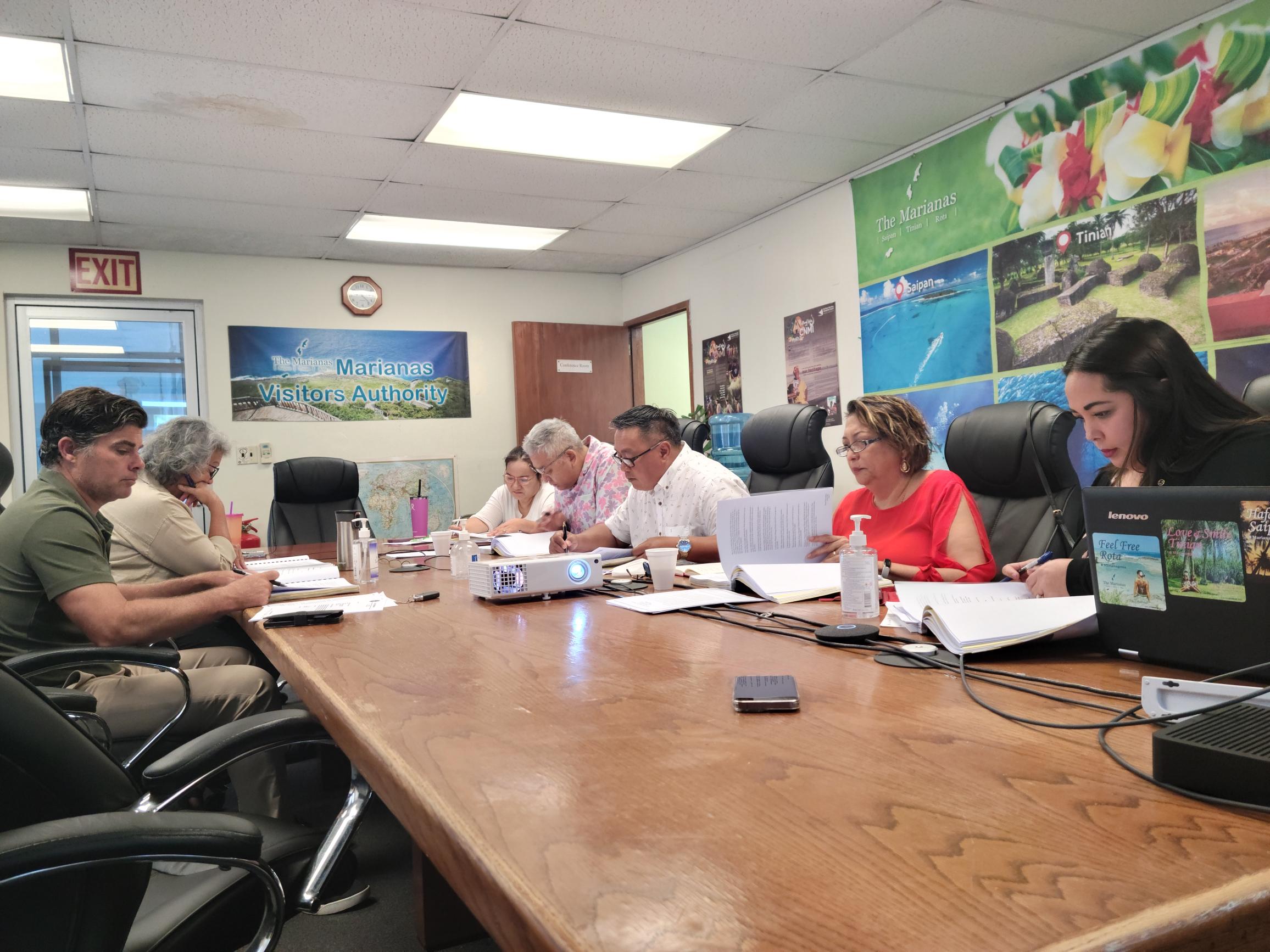 Marianas Visitors Authority Managing Director Priscilla Iakopo, right, attends a meeting of the MVA board on Tuesday at its office.