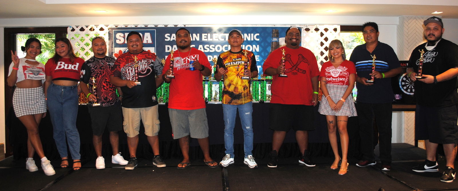 The Top Gun awardees pose  with the Budweiser models during the SEDA Bud Light League awards banquet Saturday at the PIC.
