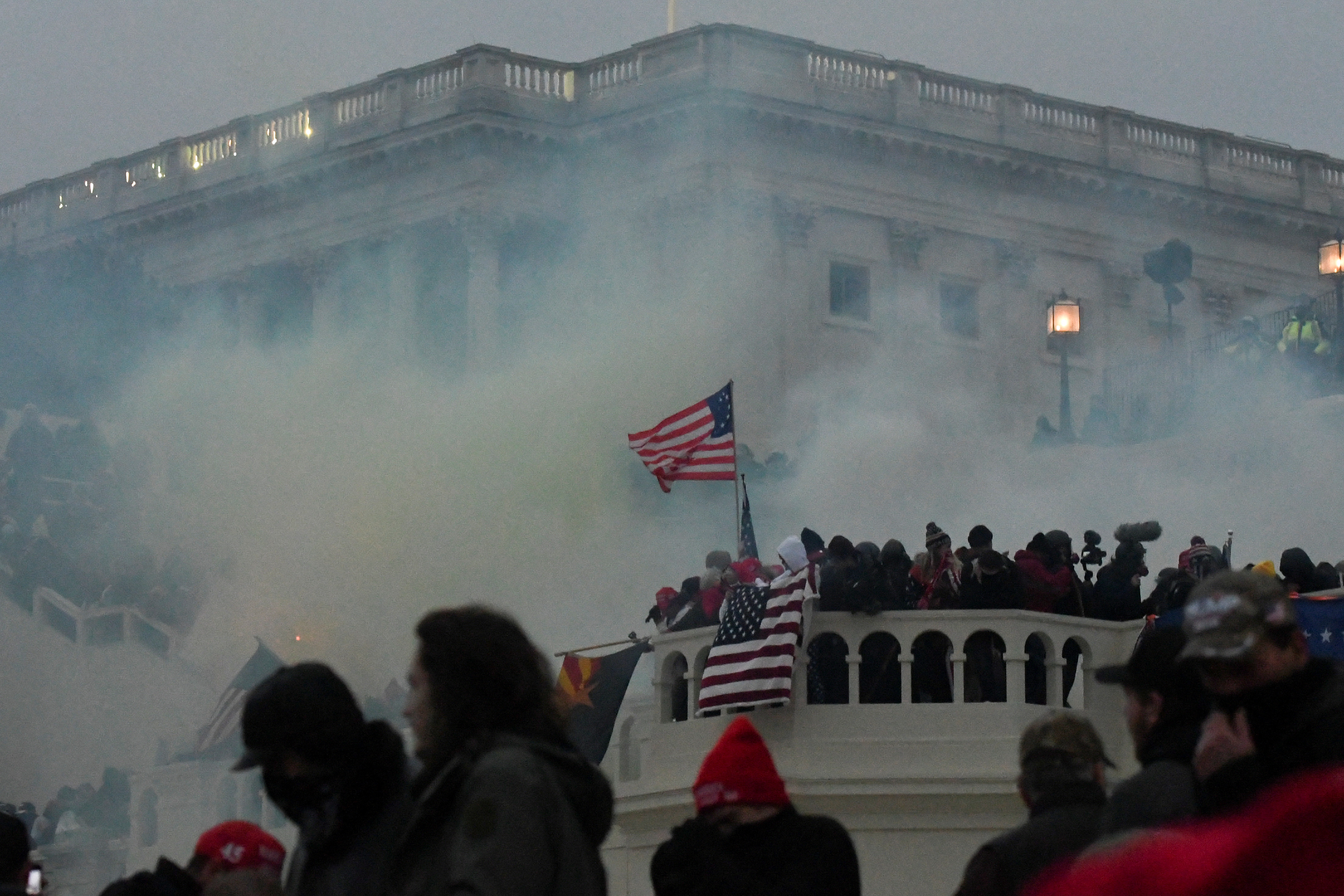 Police clear the U.S. Capitol with tear gas as supporters of President Donald Trump gather outside in Washington, D.C. on Jan. 6, 2021.