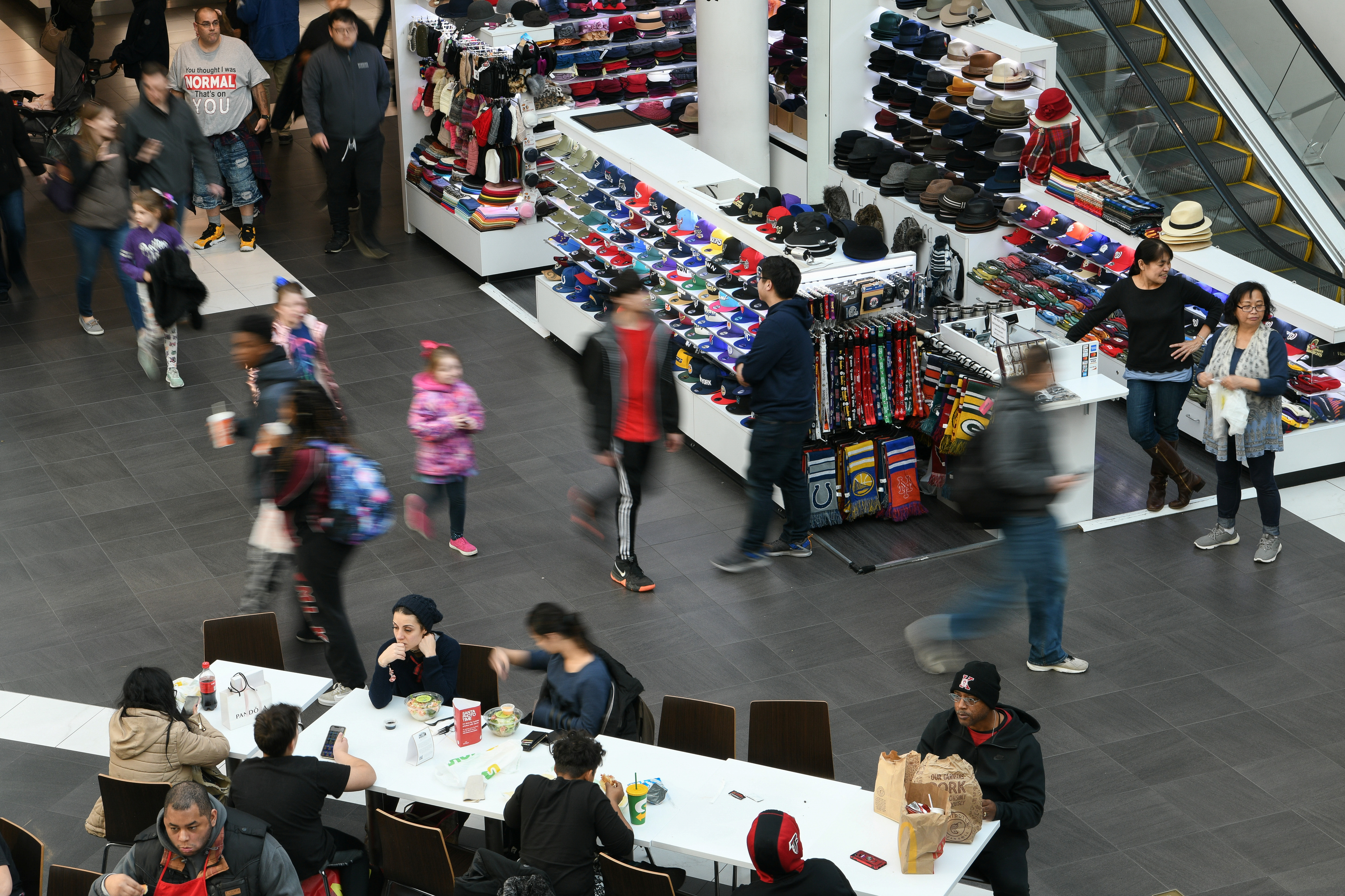 Shoppers look for deals at the Pentagon City Mall in Arlington, Virginia, Nov. 29, 2019.