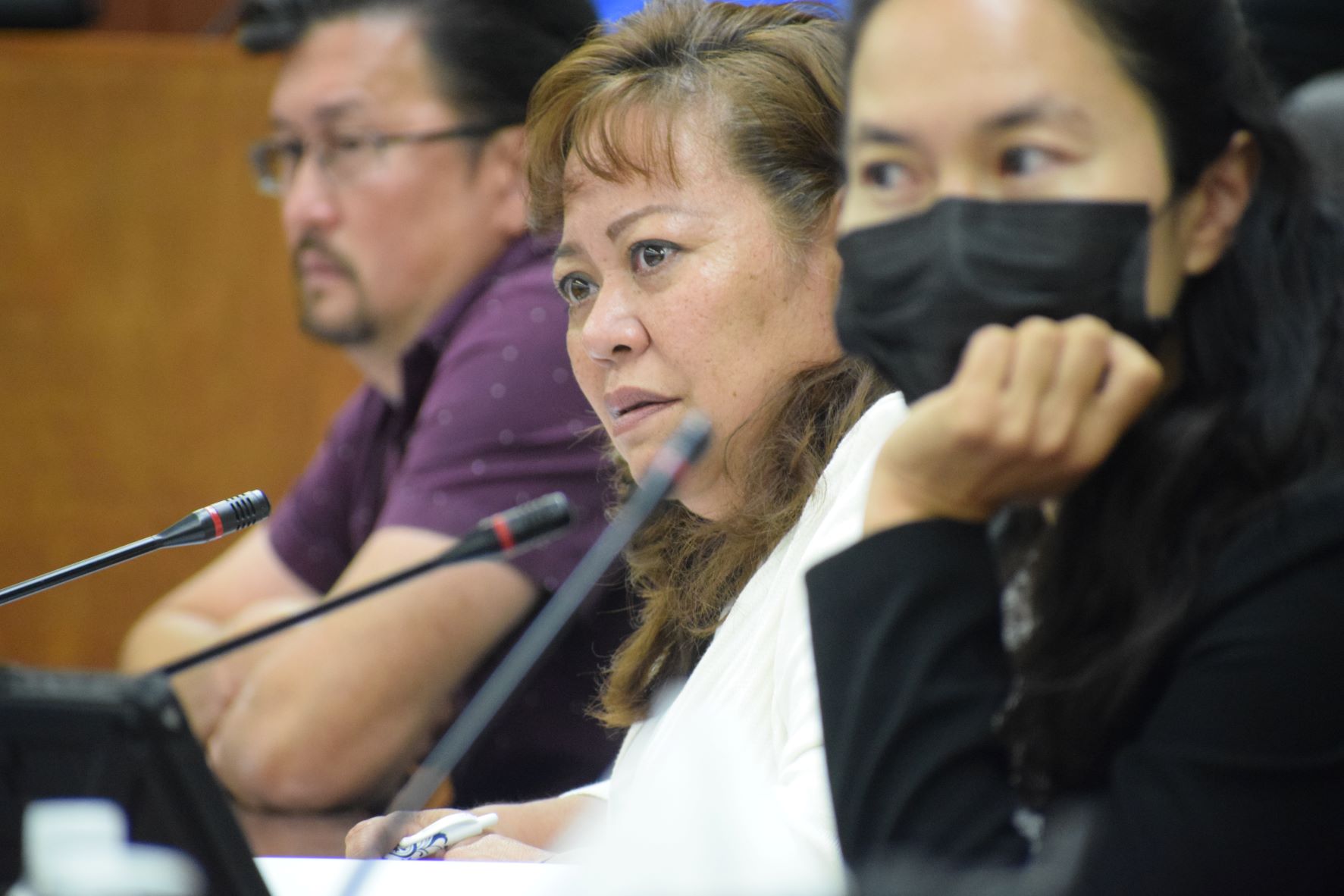 Rep. Celina Babauta, center, recuses herself from voting on the retiree-bonus bill, saying she has a conflict because her husband, former Rep. Franklin Babauta, is a retiree. Also in photo are Reps. Edwin Propst and Tina Sablan.