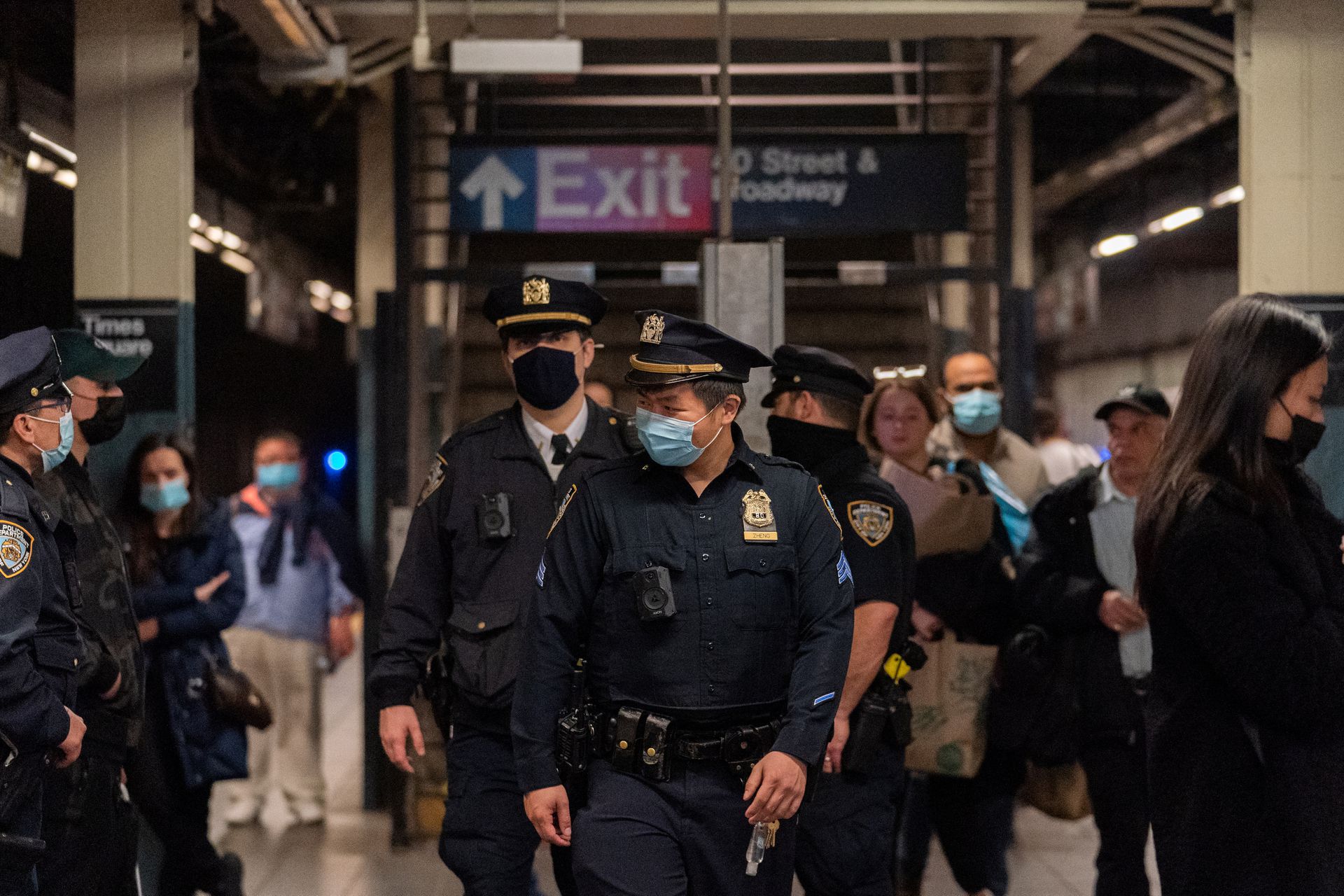 Police officers patrol in Times Square station, after a shooting at a subway station in Brooklyn borough, in Manhattan, New York City on April 12, 2022.