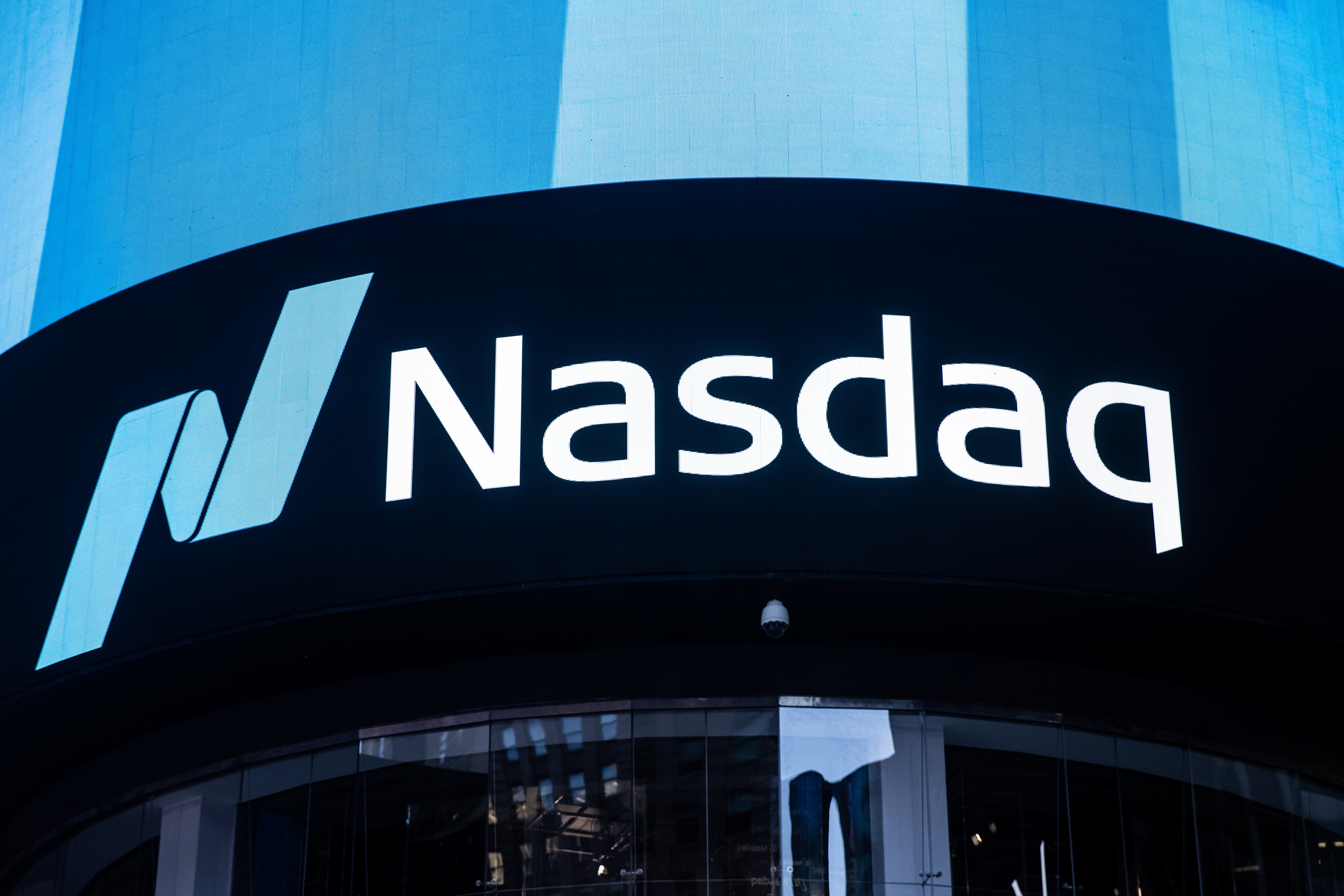 The Nasdaq logo is displayed at the Nasdaq Market site in Times Square in New York City, Dec. 3, 2021. 