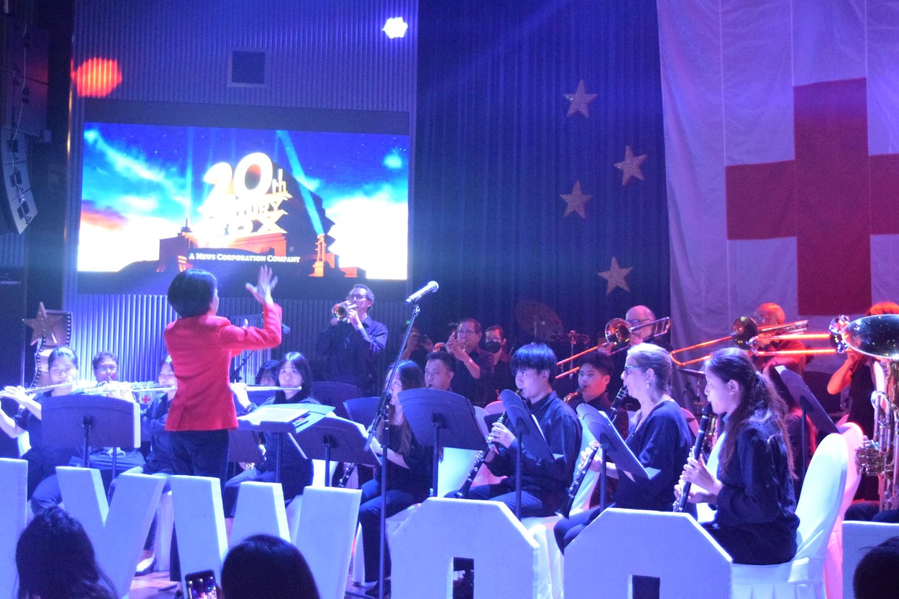 The Saipan Pacific Winds Concert Band performs Hollywood movie theme songs during the Red Gala in the Kensington ballroom on Saturday.