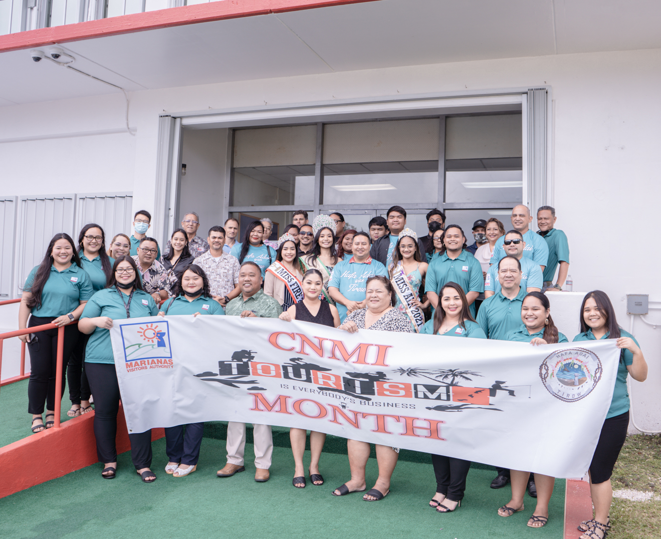 Governor Ralph DLG Torres poses for a photo with lawmakers, Marianas Visitors Authority officials and staff as well as other community members after signing a proclamation designating May as Marianas Tourism Month.  He noted that tourism “is the primary economic driver for the Marianas, comprising about three-fourths of the entire economy.”
