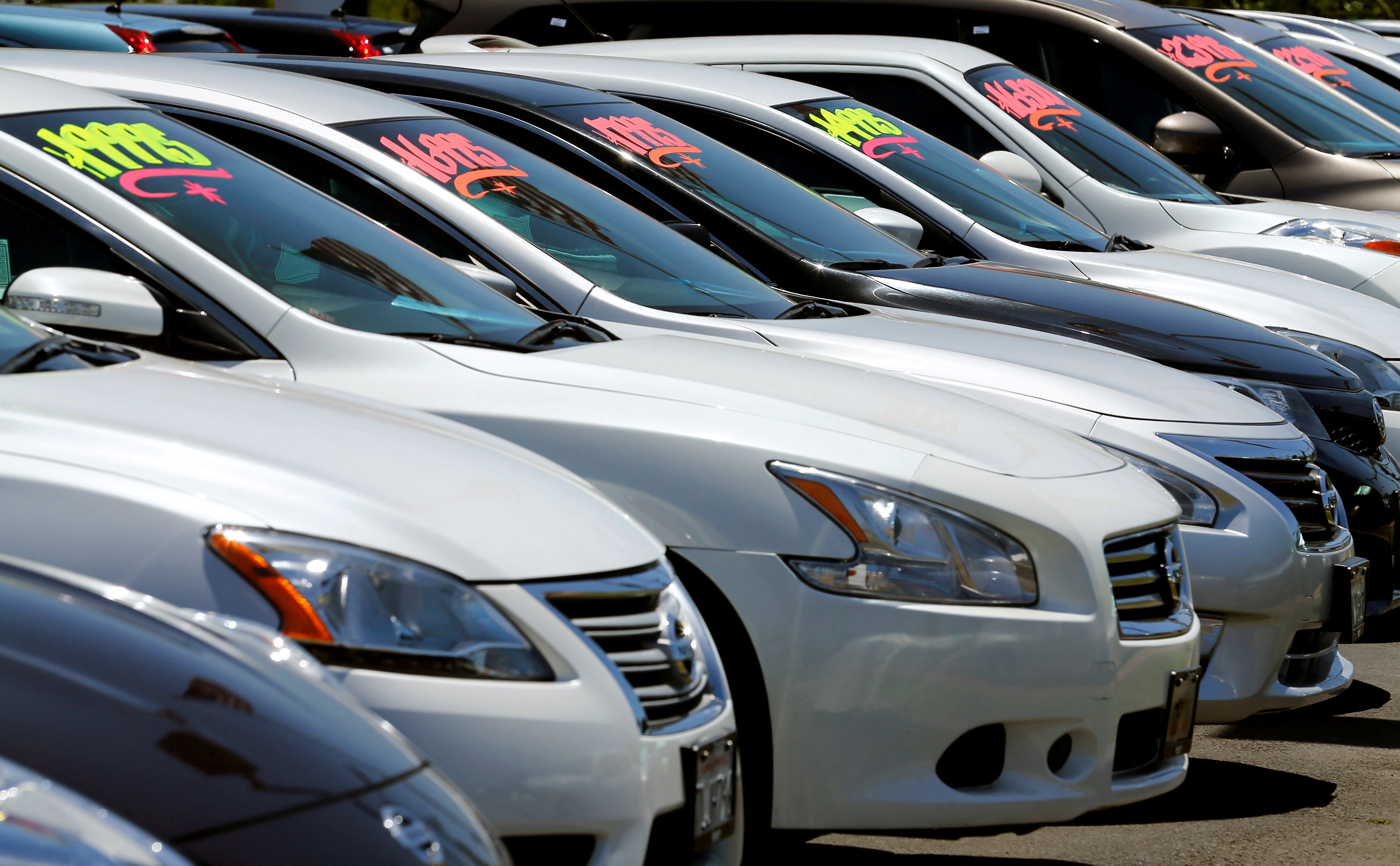Automobiles are shown for sale at a car dealership in Carlsbad, California, May 2, 2016.