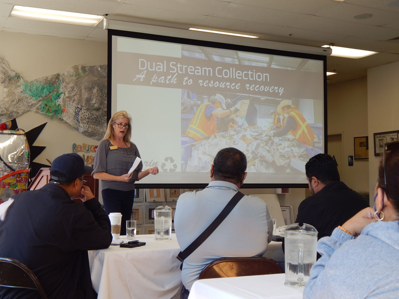 Outreach manager for Marin Sanitary Service Jennifer Selvig makes a presentation on Marin Sanitary Service’s Dual Streem Collection. As part of this service, Marin Sanitary Services has partitioned, two-in-one recycling bins and specially designed garbage trucks that separate recycled bottles, cans, and containers from paper products.