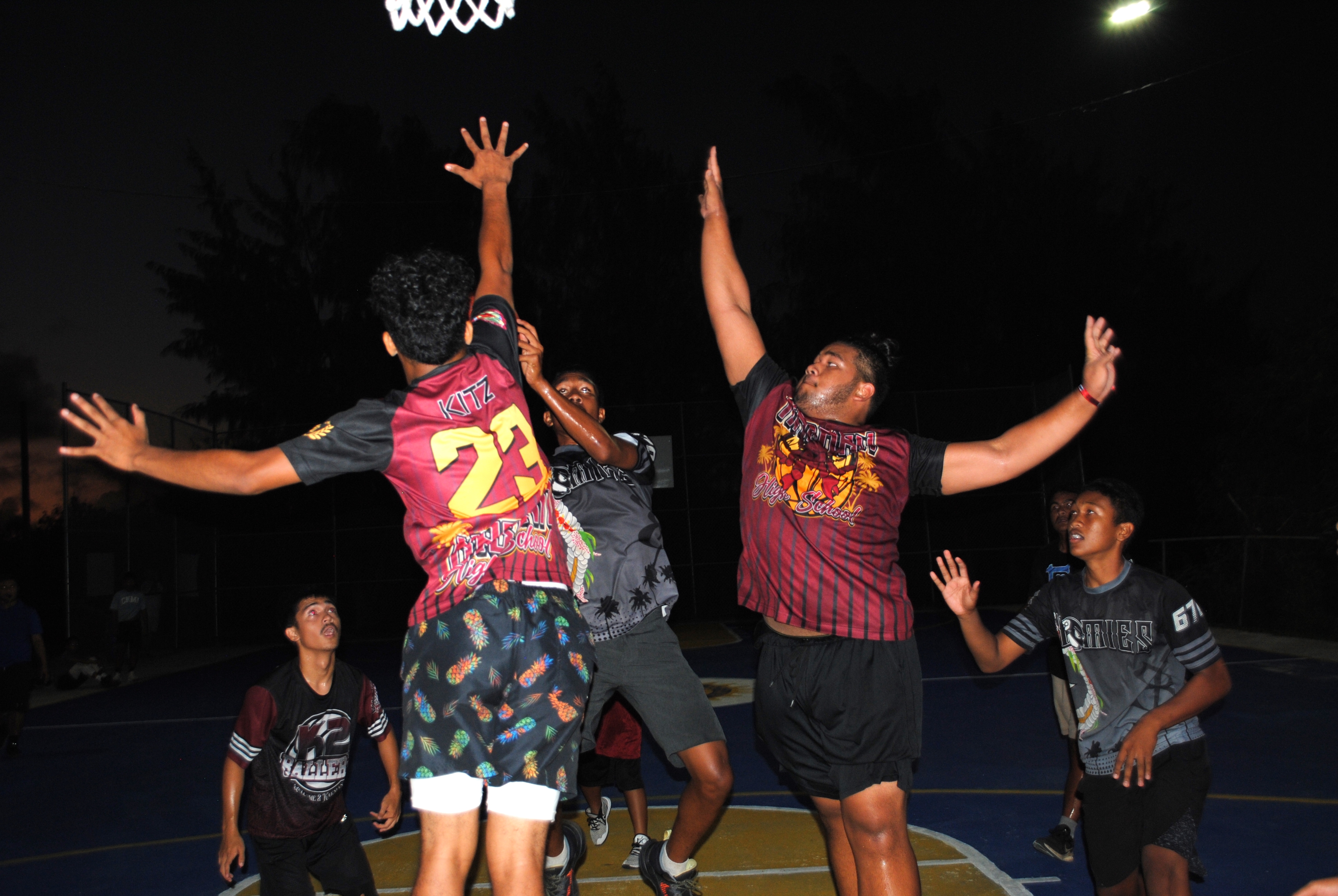 K2 Ballers' Kaipo Dikito and Garret Mariano extend for the block.