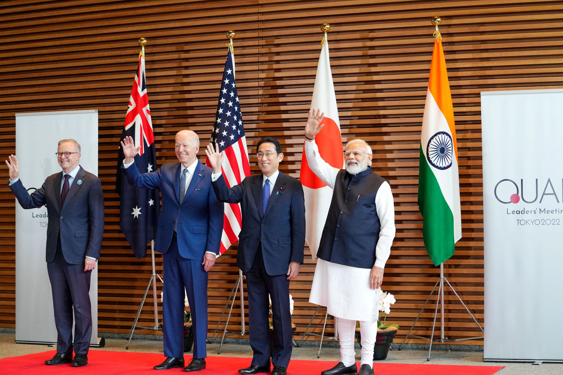 Prime Minister of Australia Anthony Albanese, U.S. President Joe Biden, Prime Minister of Japan Fumio Kishida and Prime Minister of India Narendra Modi pose for photos at the entrance hall of the prime minister’s office of Japan in Tokyo, May 24, 2022.