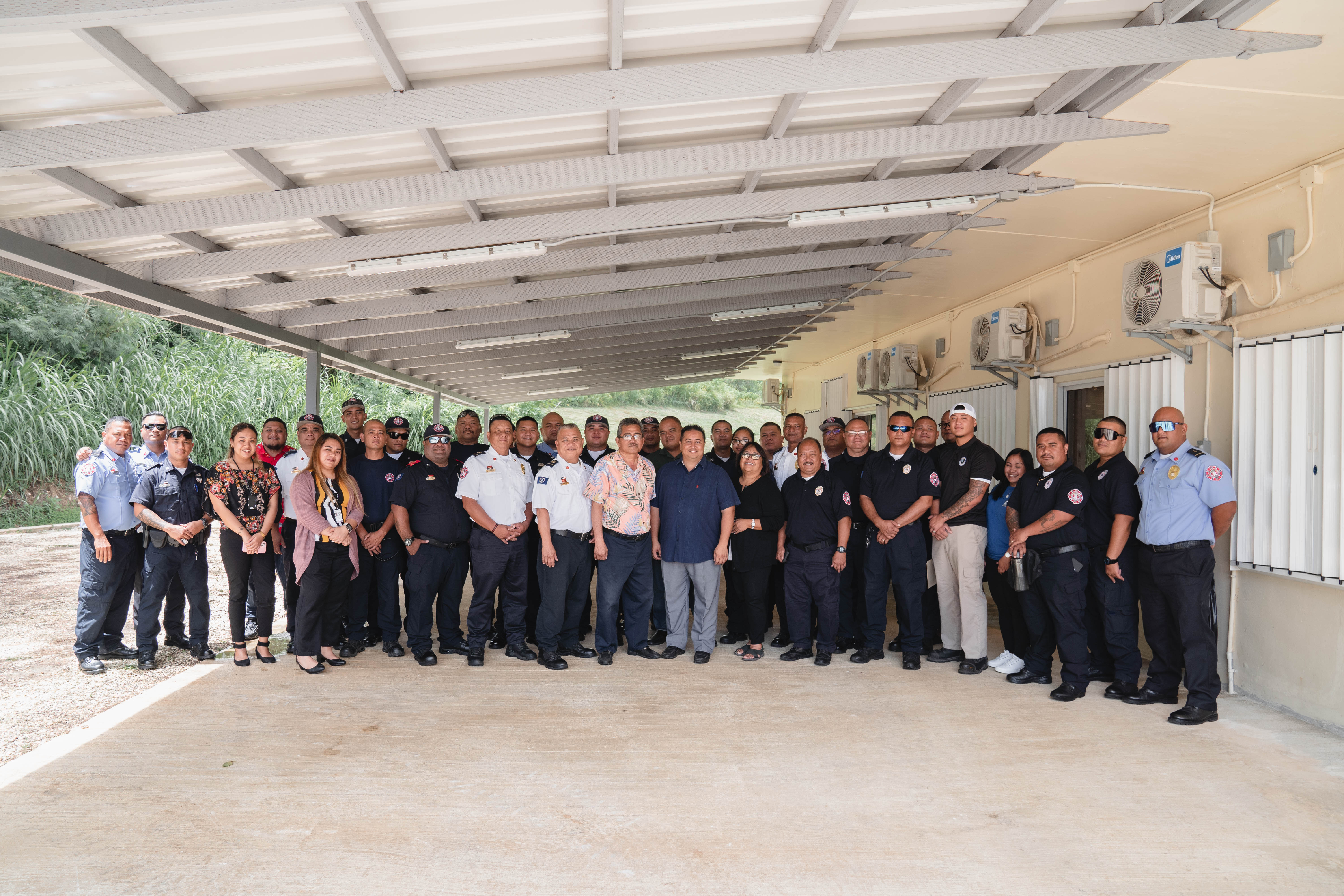 Governor Ralph DLG Torres poses for a photo with Rota Mayor Efraim Atalig and Department of Fire and Emergency Medical Services officials and personnel after signing a proclamation designating May 18 as NMI Emergency Medical Services for Children Day.