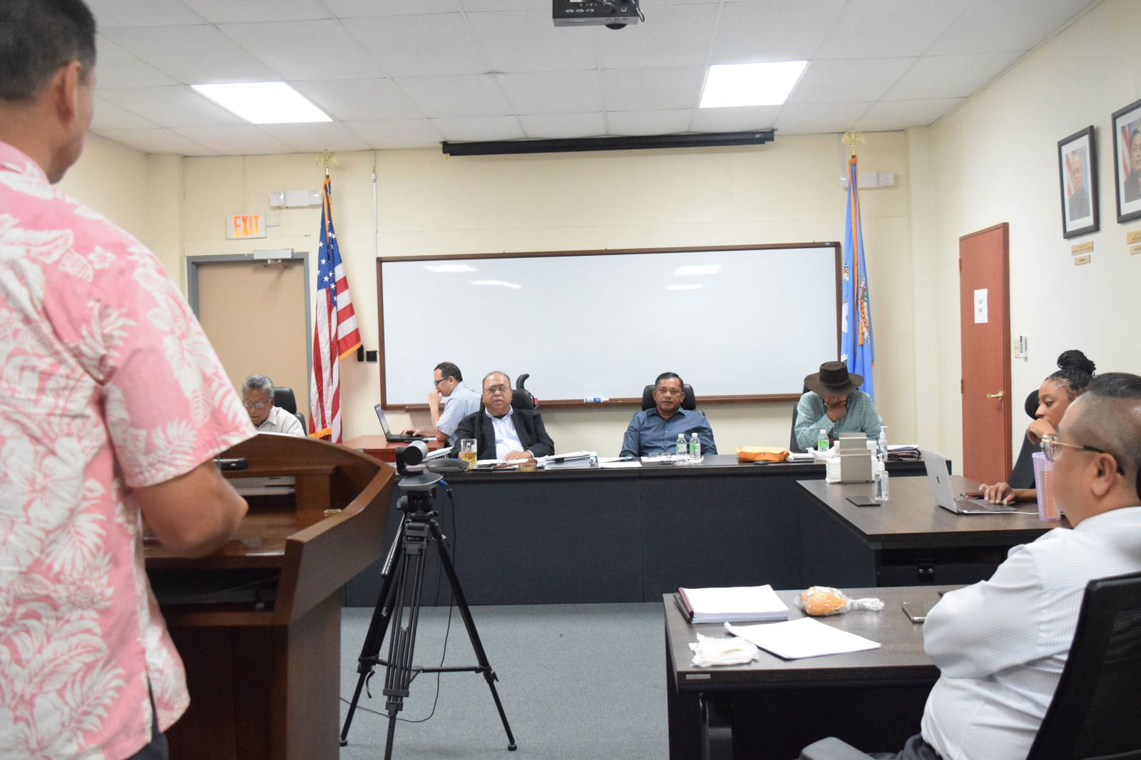 Commonwealth Casino Commission Chairman Edward C. Deleon Guerrero, center background, asks Imperial Pacific International acting CEO Tao Xing a question as commission vice chairman Ralph Demapan, commissioner Ramon Dela  Cruz, and executive director Andrew Yeom, right, listen during a meeting  Thursday in the commission's conference room at Springs Plaza in Gualo Rai.Photo by Emmanuel T. Erediano