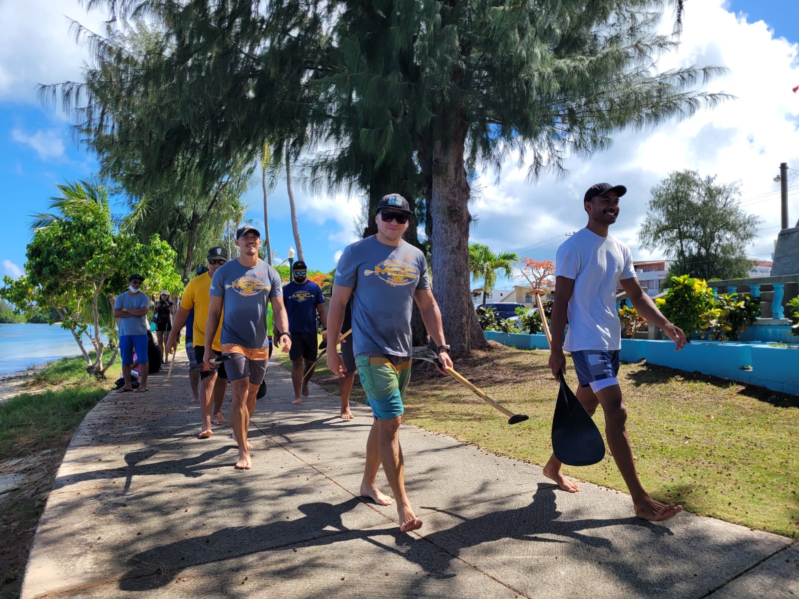 Prospective members of the CNMI men's team make their way to the canoes.