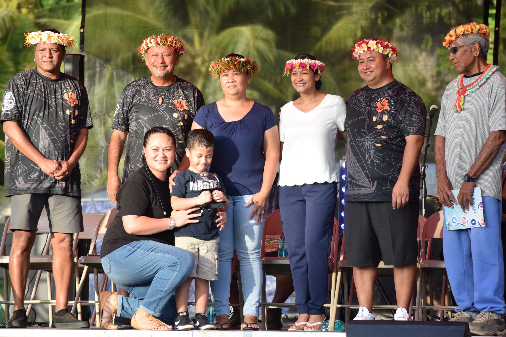 Gov. Ralph DLG Torres, second right, and first lady Diann Torres, 3rd right, join the family of the late local artist Anthony Hosono. Also in picture are Department of Community and Cultural Affairs Secretary Joseph P. Deleon Guerrero, 2nd left, indigenous culture advocate Lino Olopai, right, and Arts Council Executive Director Parker Yobei, left.