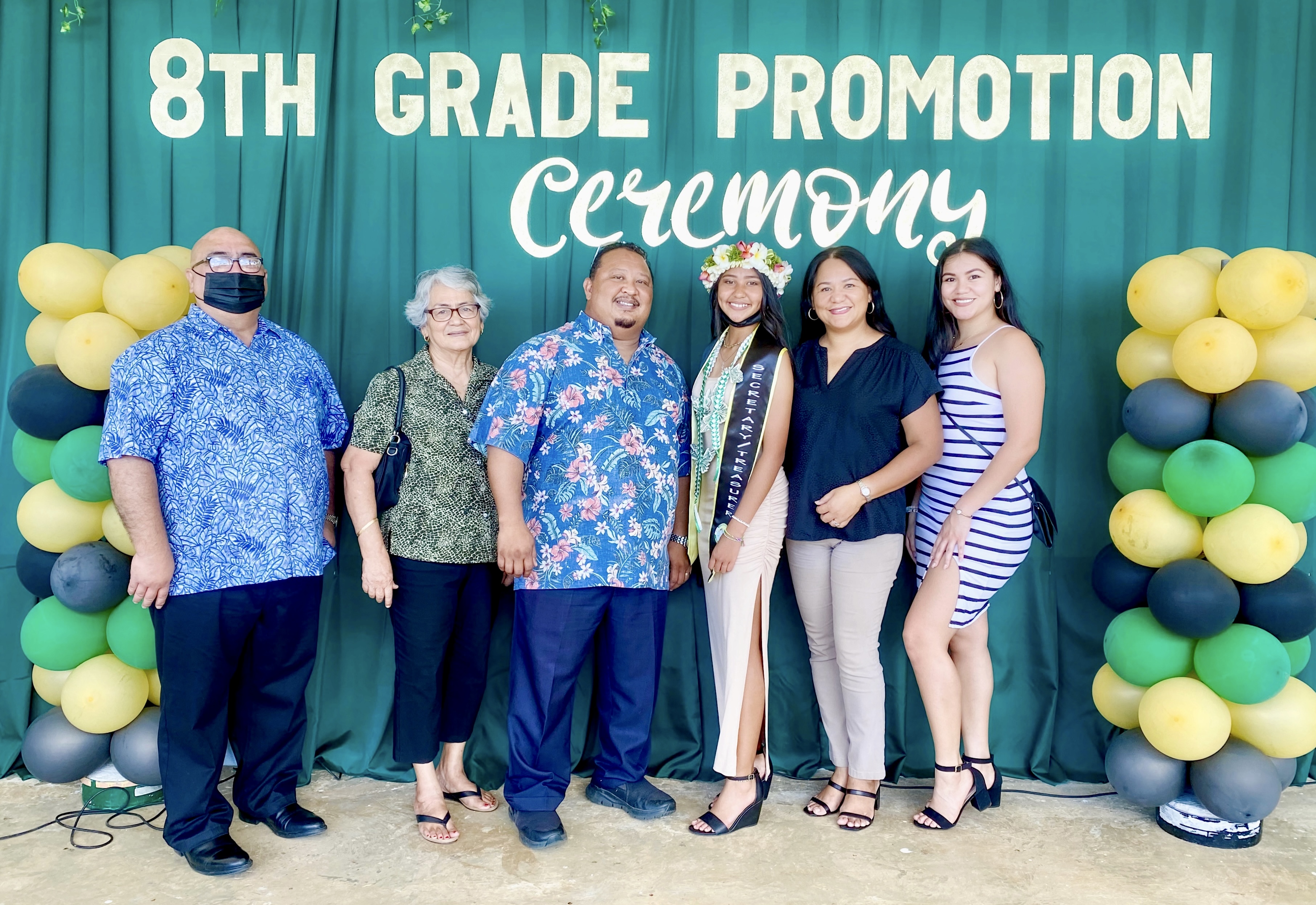Jack Torres and wife Irene Tudela Torres, with her mother, Ana Tudela, and daughter Tiana Reyes celebrate the promotion of Jack and Irene’s daughter Jacqlene Torres. Also in photo is Principal James Sablan.