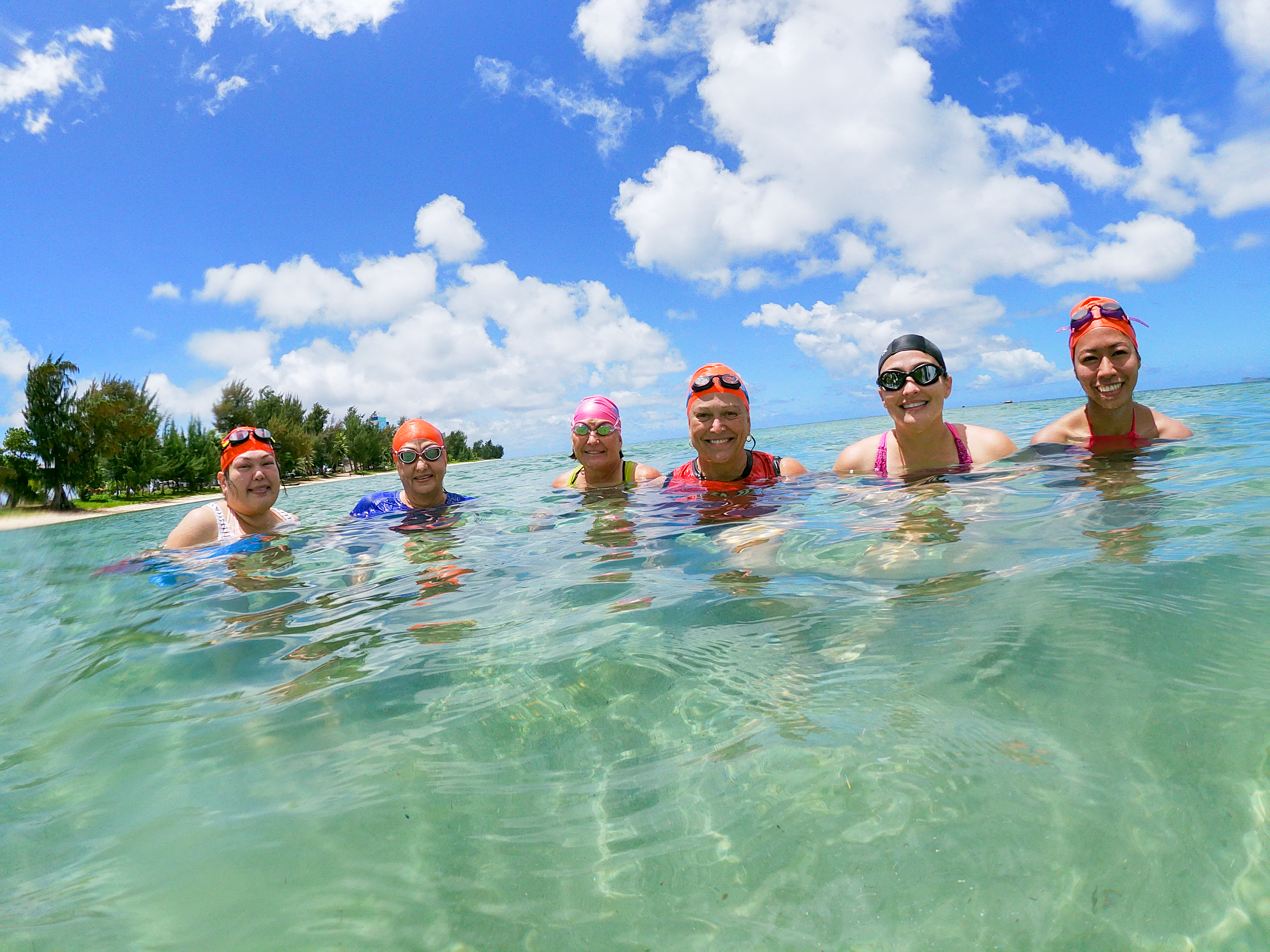Sirena Project swimmers with swim coach Emma Perez, third right.