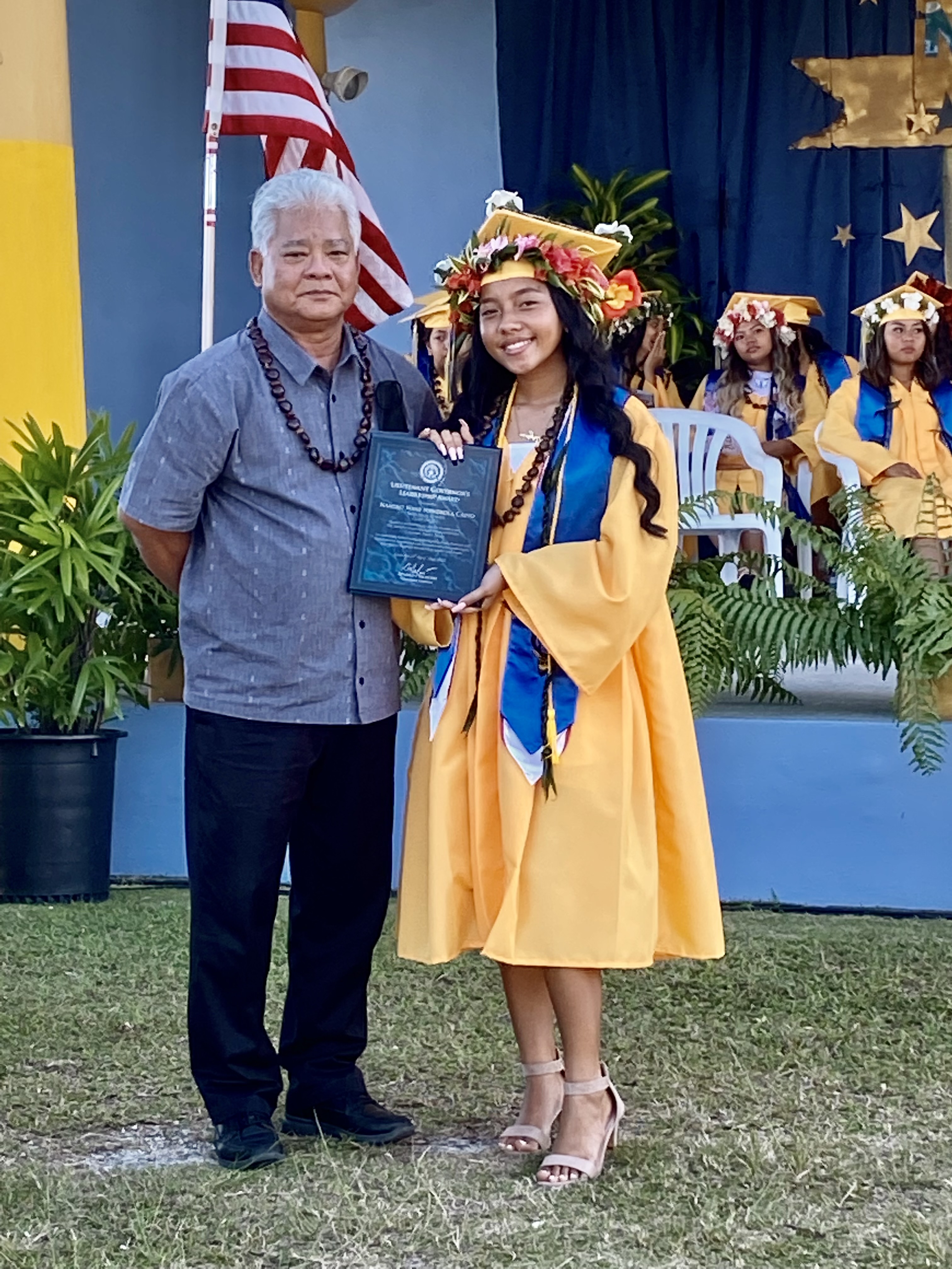 Lt. Gov. Arnold I. Palacios presents Namiko Nani Mendiola Calvo with the Lt. Governor’s Award.