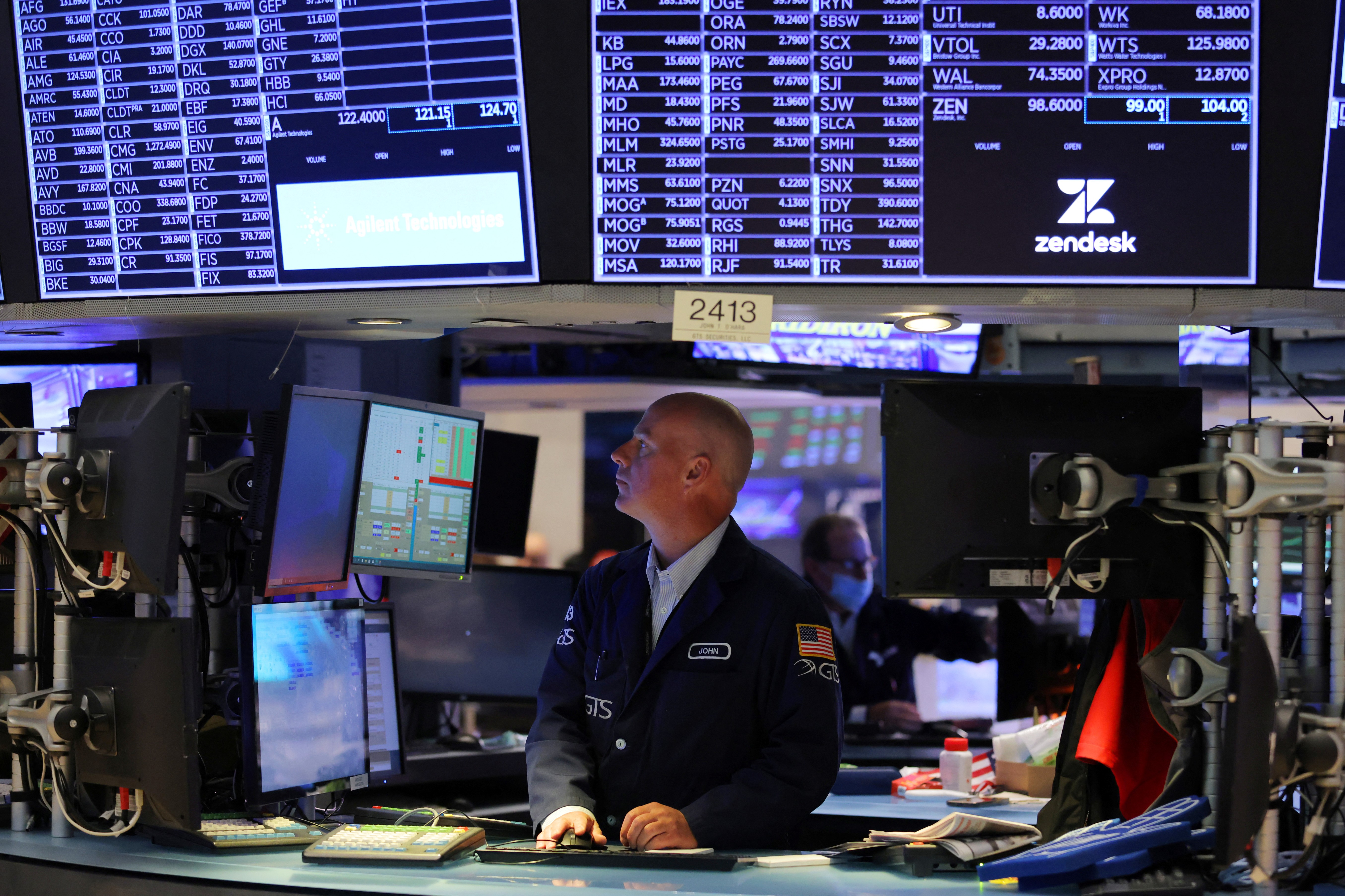 A trader works on the trading floor at the New York Stock Exchange  in Manhattan, New York City, May 20, 2022.
