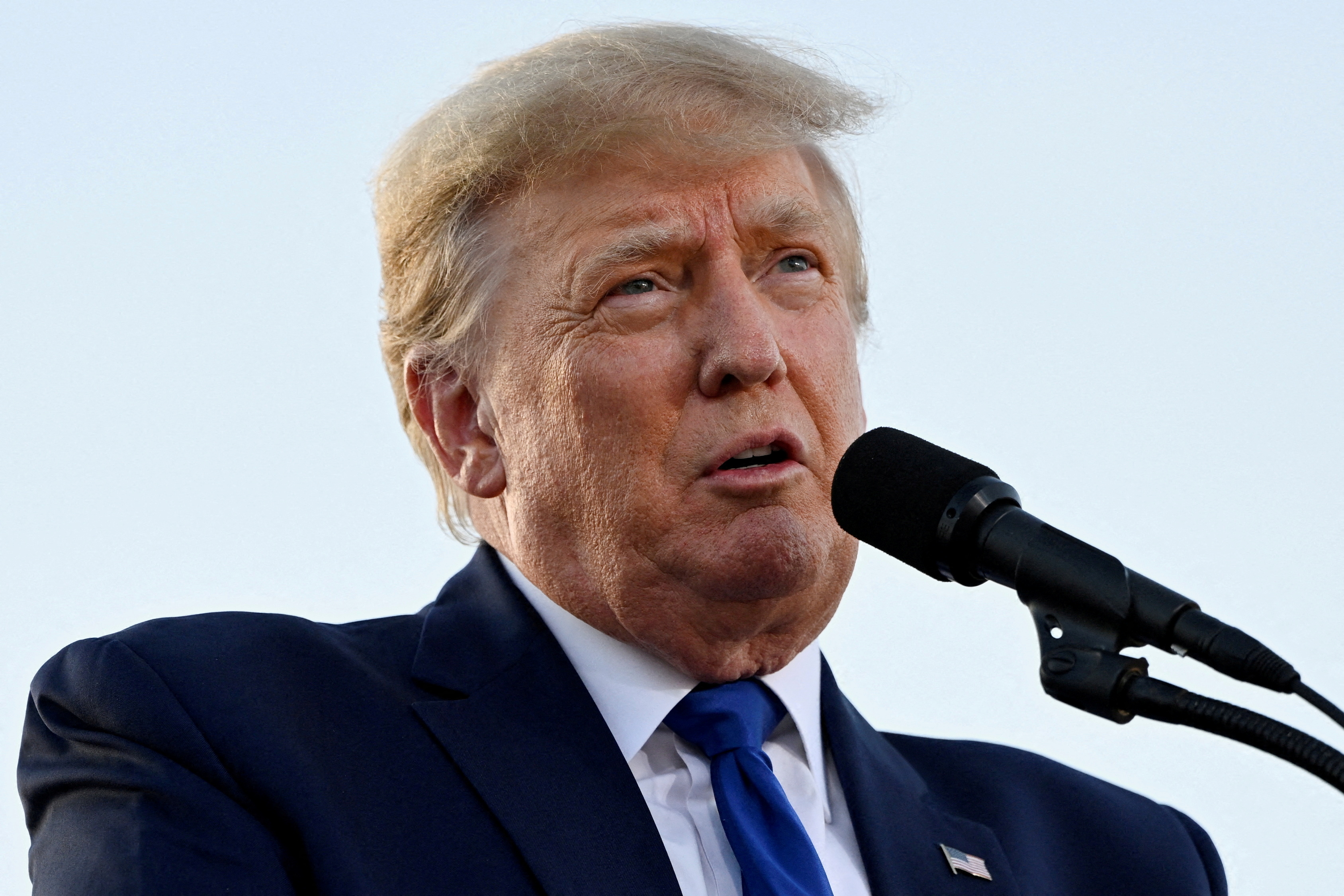 Former  President Donald Trump speaks during a rally to boost Ohio Republican candidates ahead of their May 3 primary election, at the county fairgrounds in Delaware, Ohio, April 23, 2022.