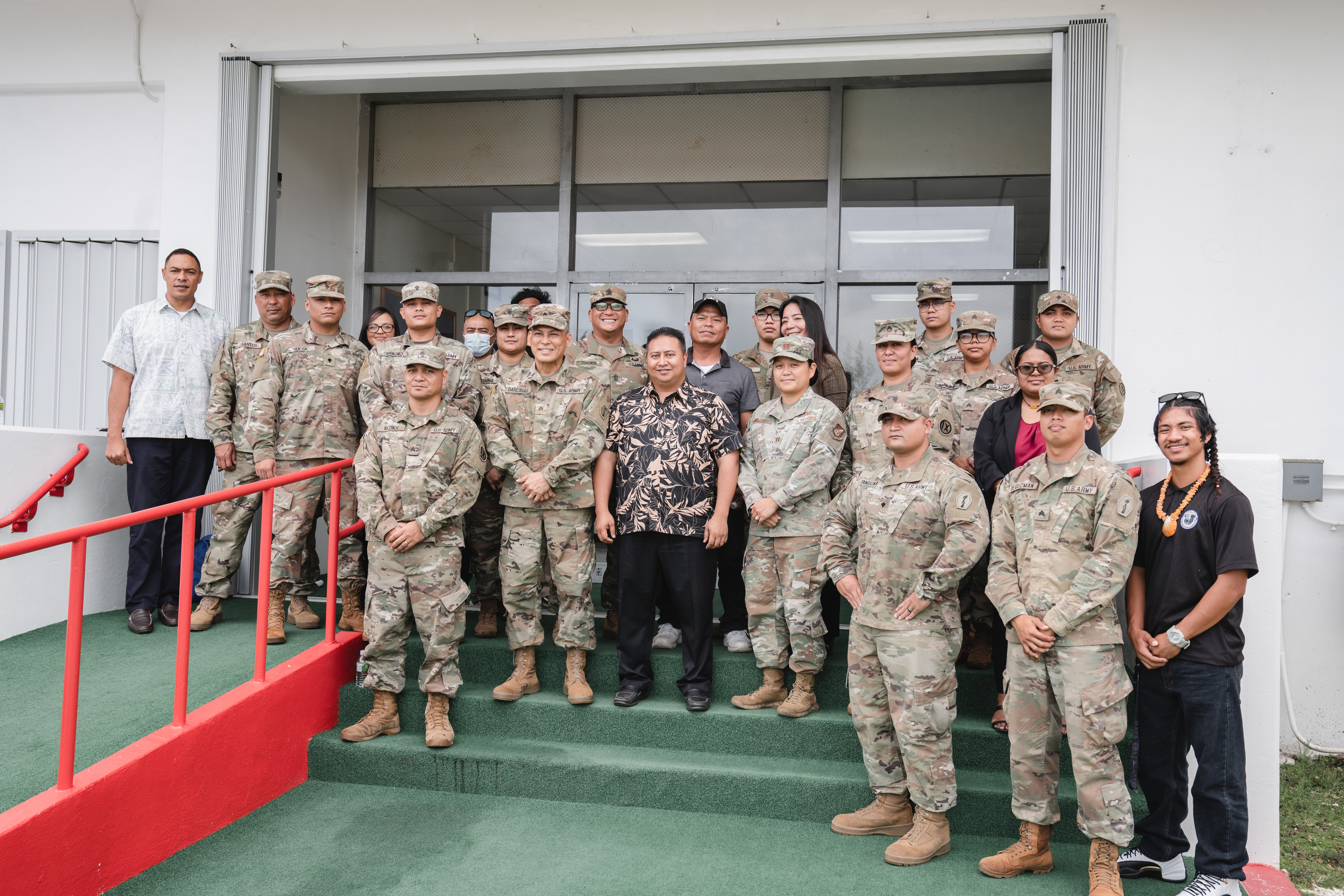 Gov. Ralph DLG Torres poses for a photo with Special Assistant for Military Affairs Glenna S. Palacios, the Commonwealth Bureau of Military Affairs, Capt. Kimberly Hofschneider, INDOPACOM LNO to the CNMI, Sgt. Saili Tigilau and soldiers from the 100th Battalion Echo Company and the 302nd Quartermaster, along with members of the community. On Thursday, the governor signed a proclamation designating the third Saturday of each May as CNMI Armed Forces Day.