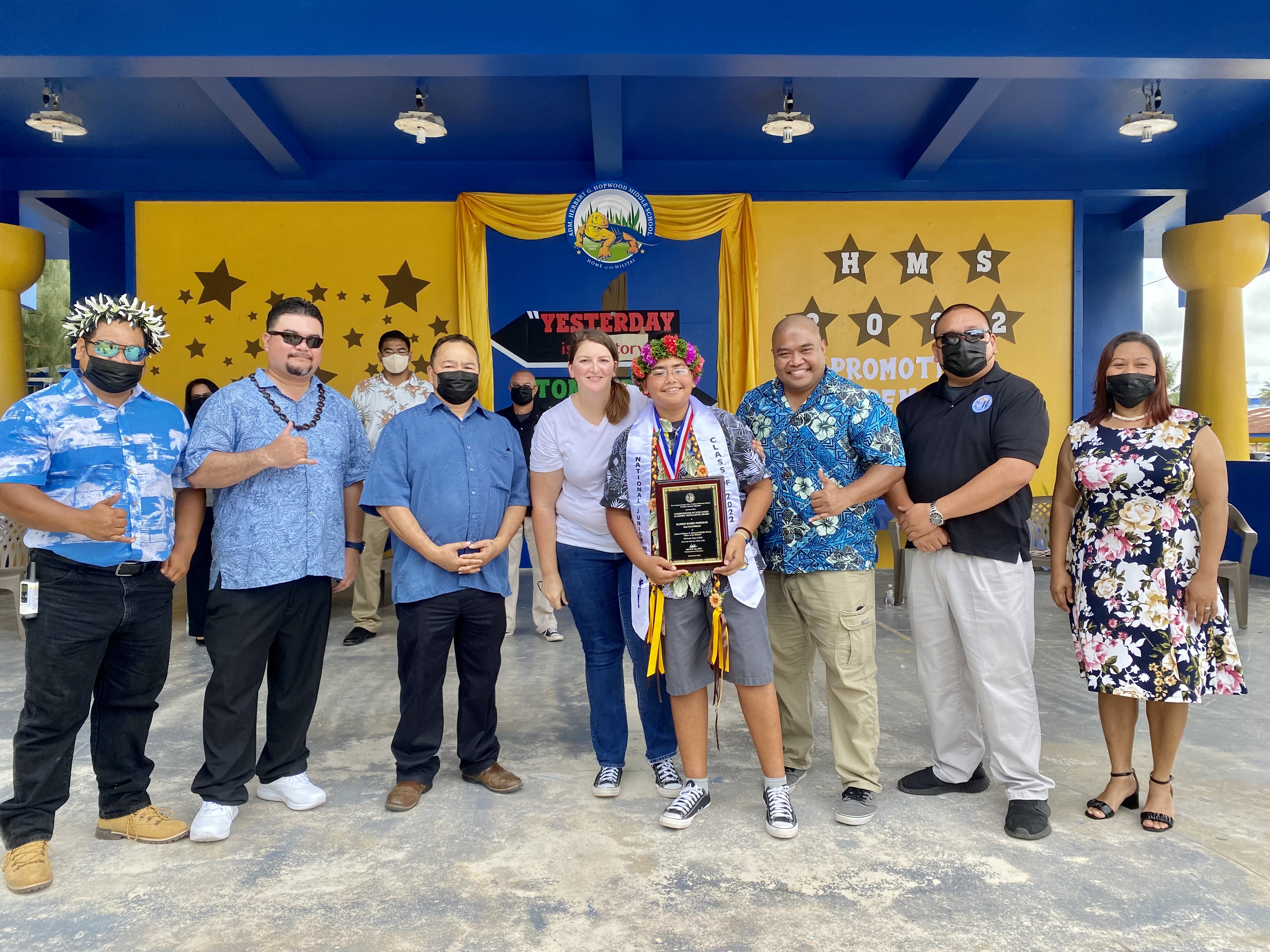 Commissioner of Education Award recipient and class salutatorian Hayden Romeo Igisomar poses for a photo with his parents, Commissioner of Education Dr. Alfred B. Ada, Associate Commissioner Eric Magofna and Hopwood administrators.