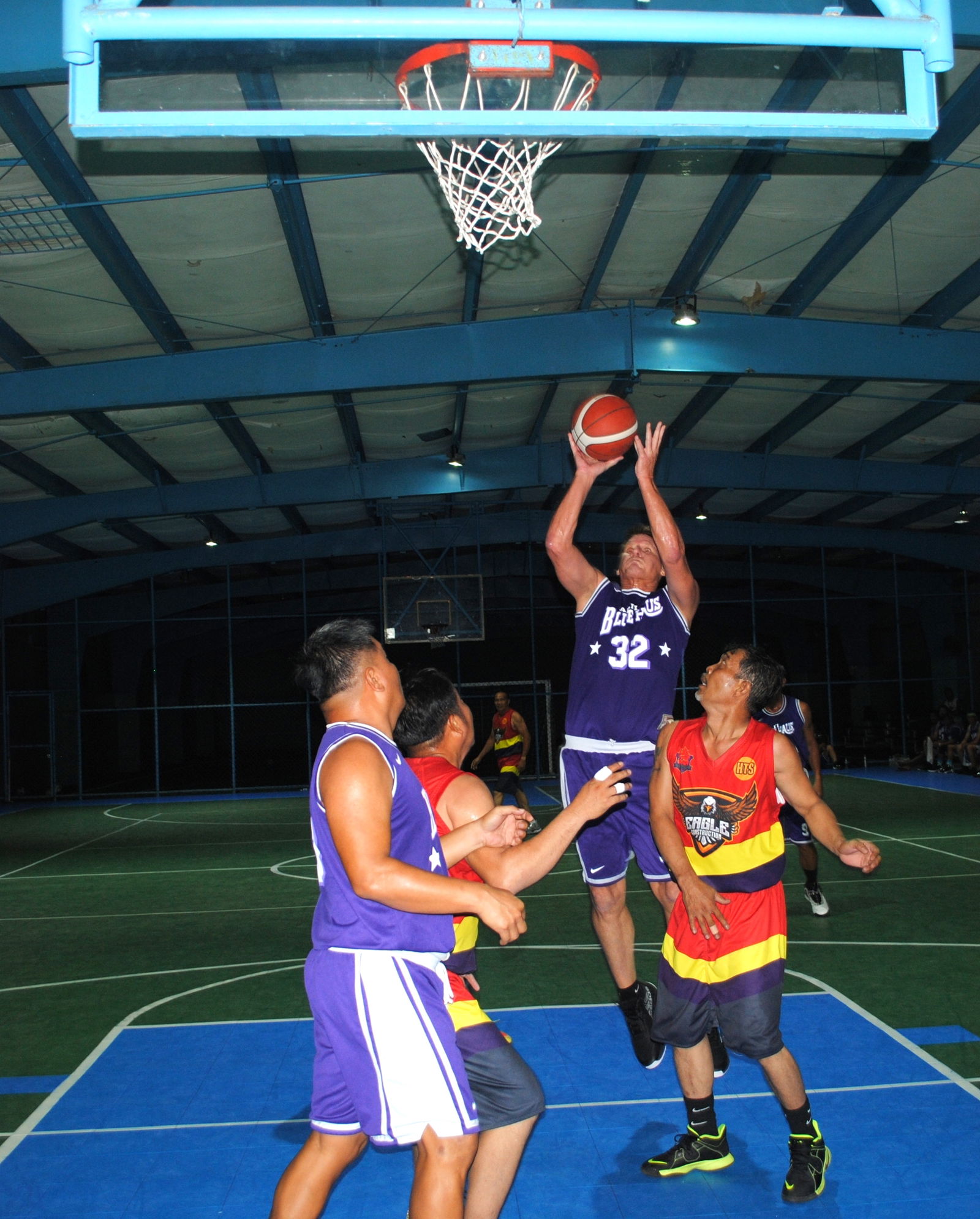 BlueHaus' Bruce Berline pulls up for the shot during game 1 of the championships series against Eagles Construction in the masters division of the Saipan Centennial Lions Club Basketball League at TSL Sports Complex on Friday.